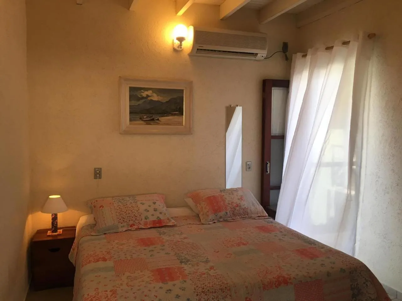 Bed in Pousada Irmãos do Mar