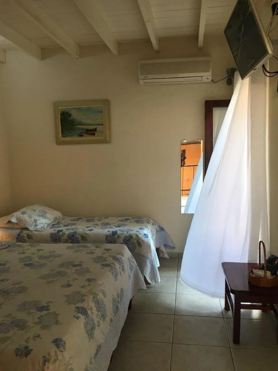 Bed in Pousada Irmãos do Mar