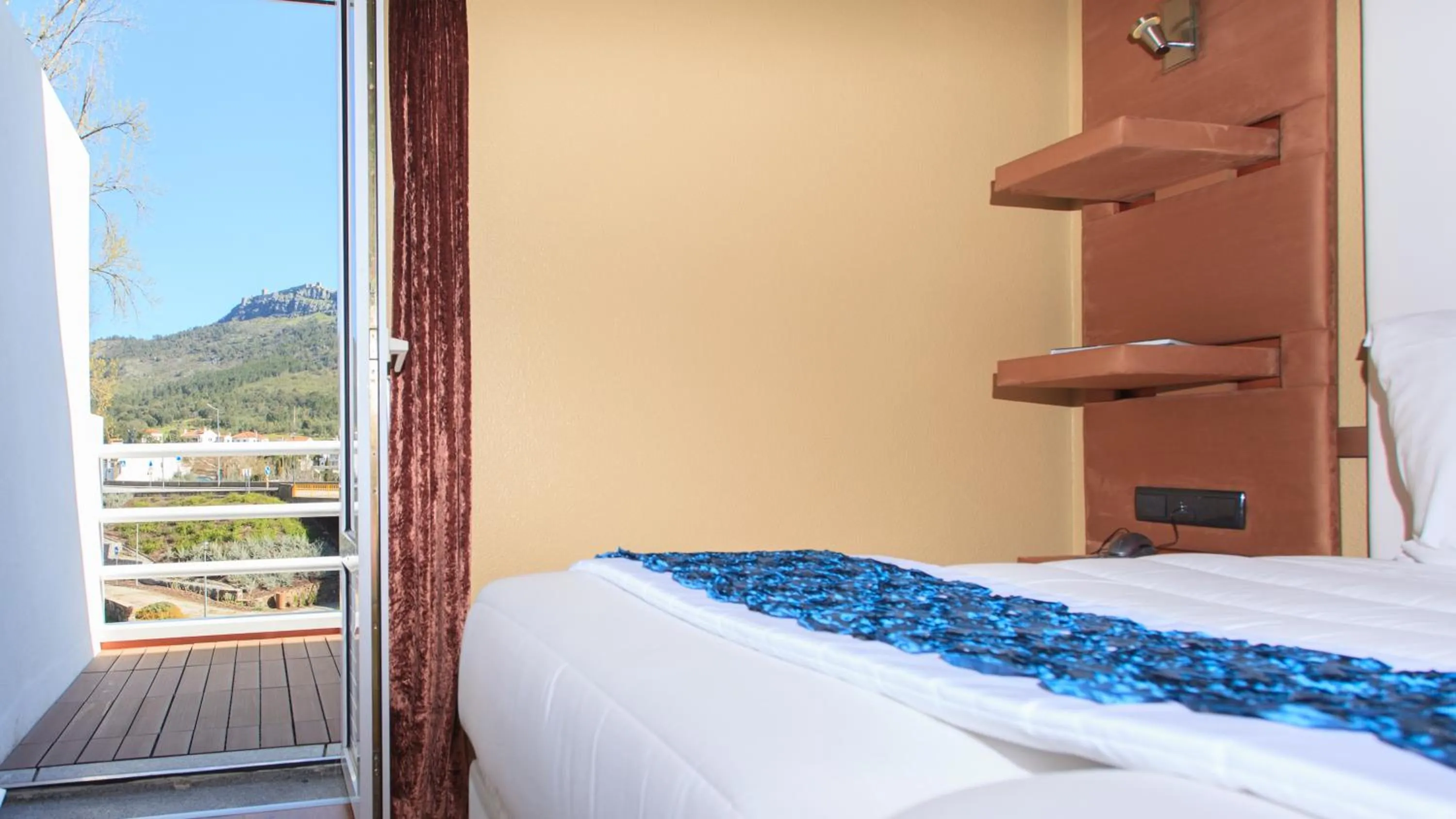 Bed in Sever Rio Hotel