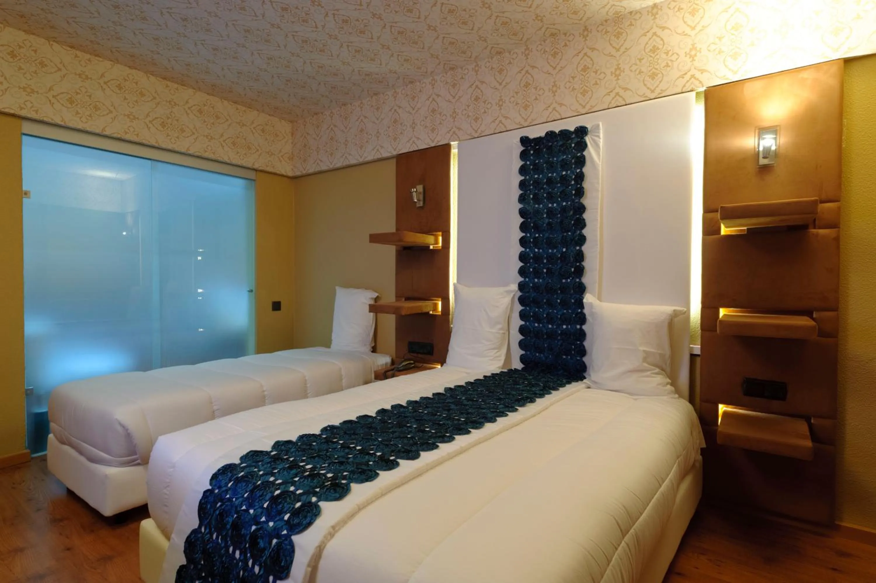 Bed in Sever Rio Hotel