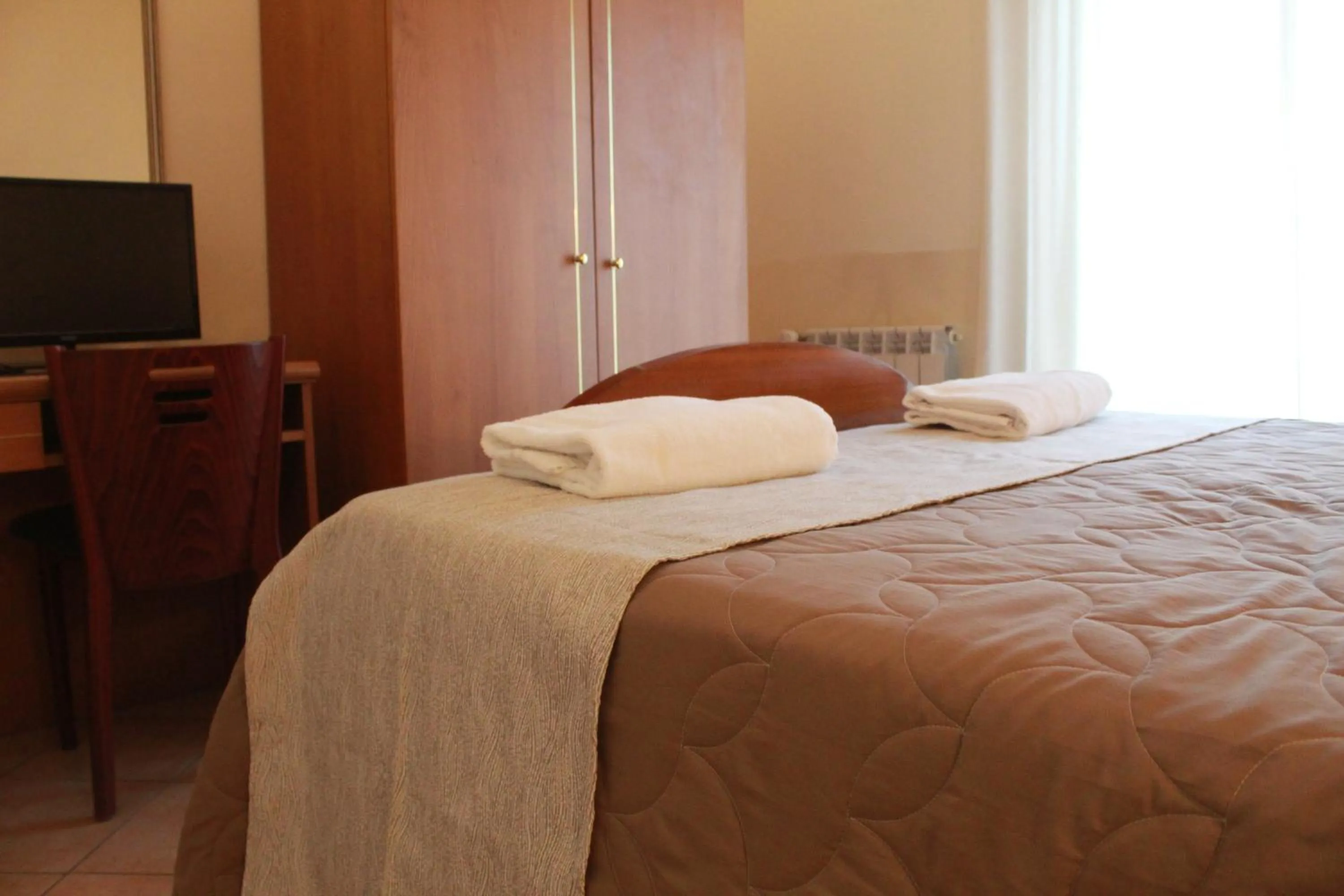 Bed in Hotel Ristorante Benigni