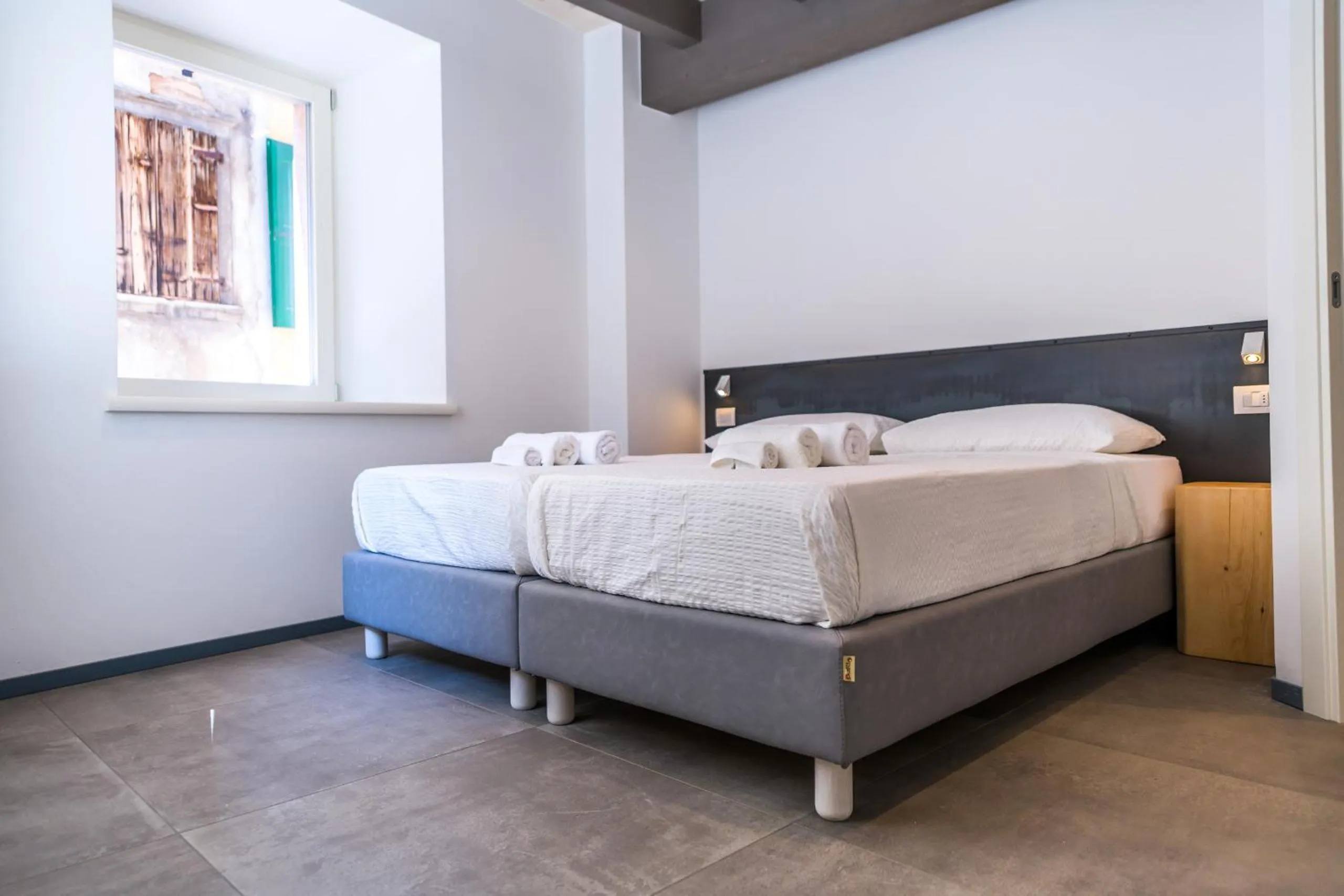 Bed in Casa Kaki - Eco friendly Apartments with Parking & Private Courtyard
