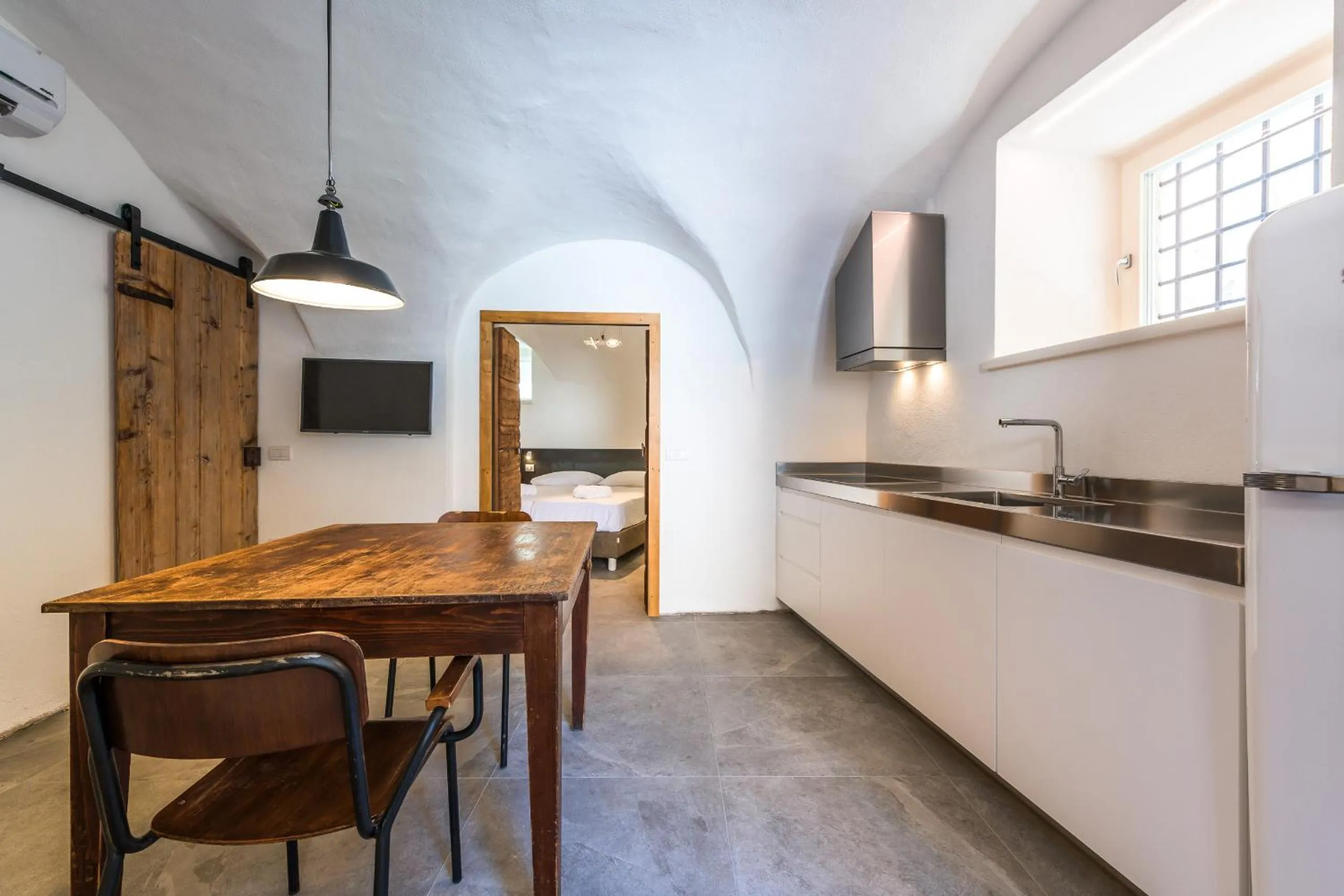Kitchen or kitchenette in Casa Kaki - Eco friendly Apartments with Parking & Private Courtyard