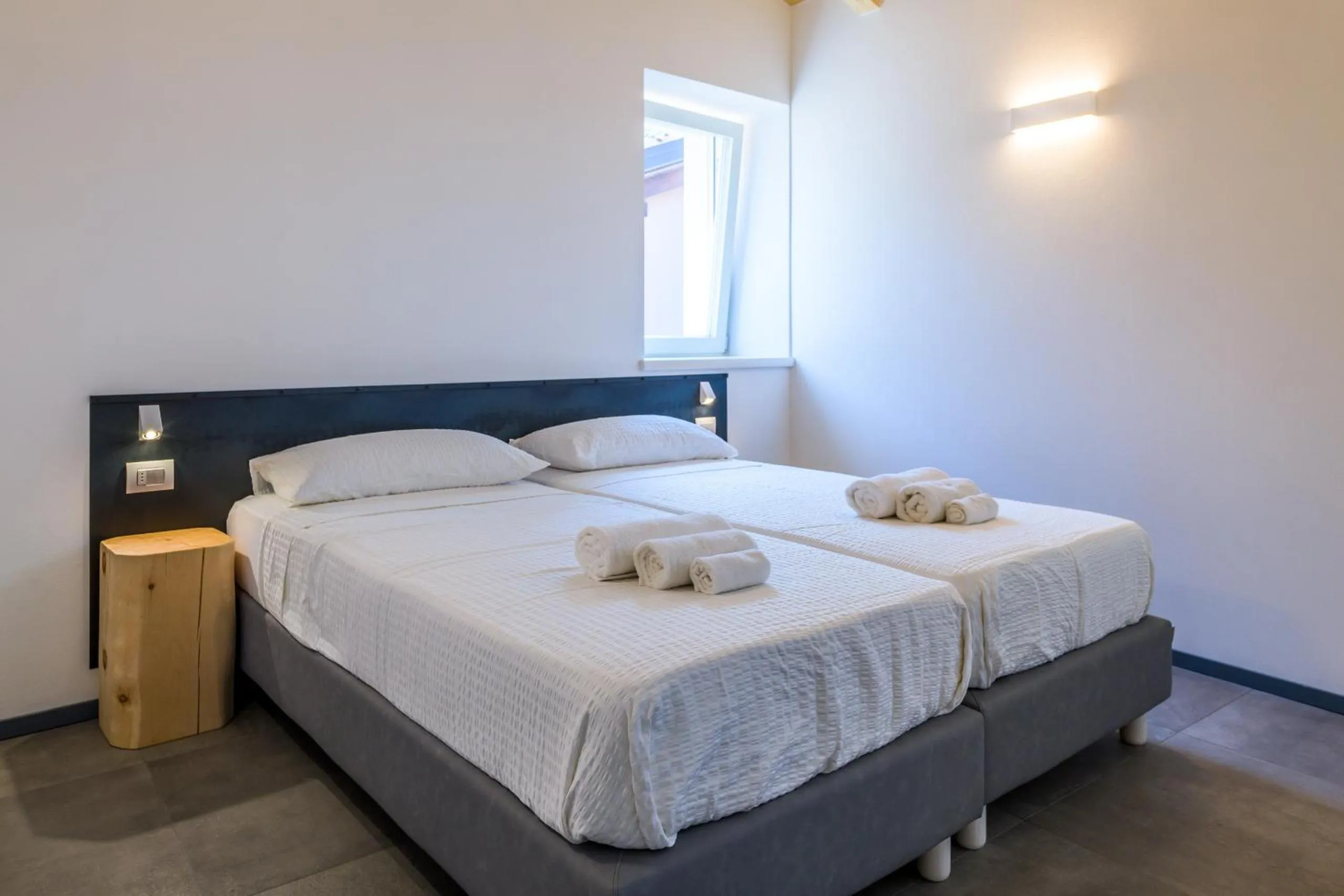 Bed in Casa Kaki - Eco friendly Apartments with Parking & Private Courtyard