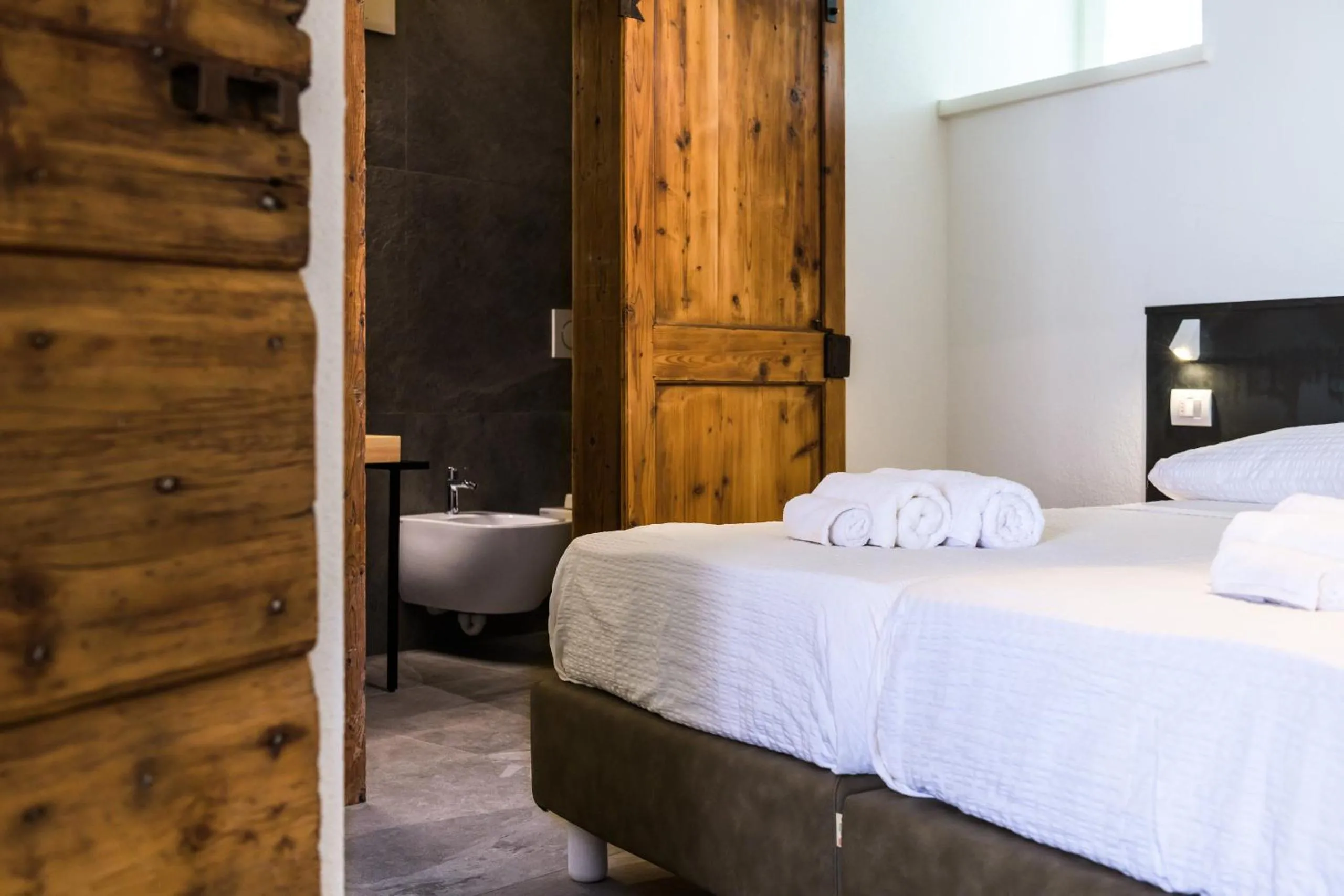 Photo of the whole room, Bed in Casa Kaki - Eco friendly Apartments with Parking & Private Courtyard