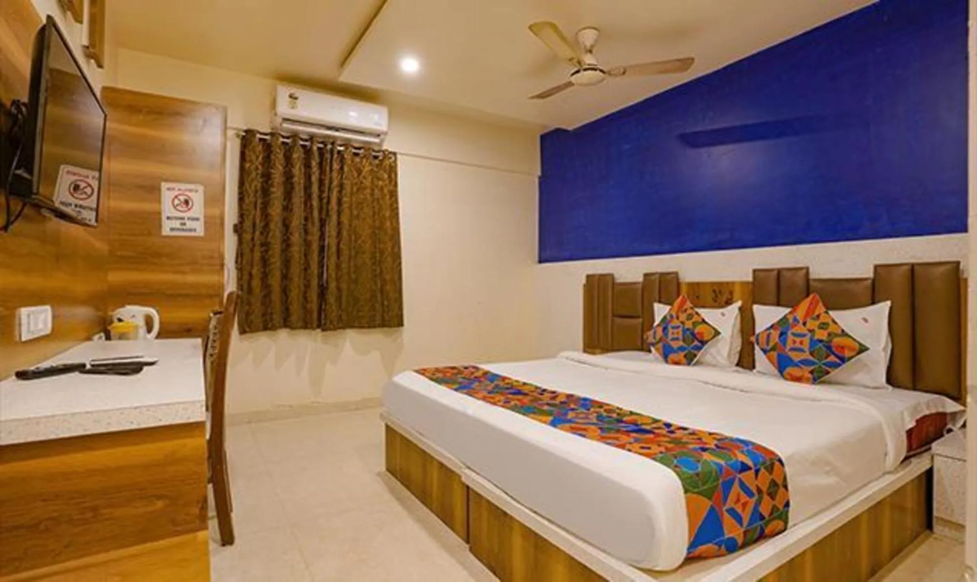 Bed in FabHotel Veera Residency - Nr Mumbai International Airport