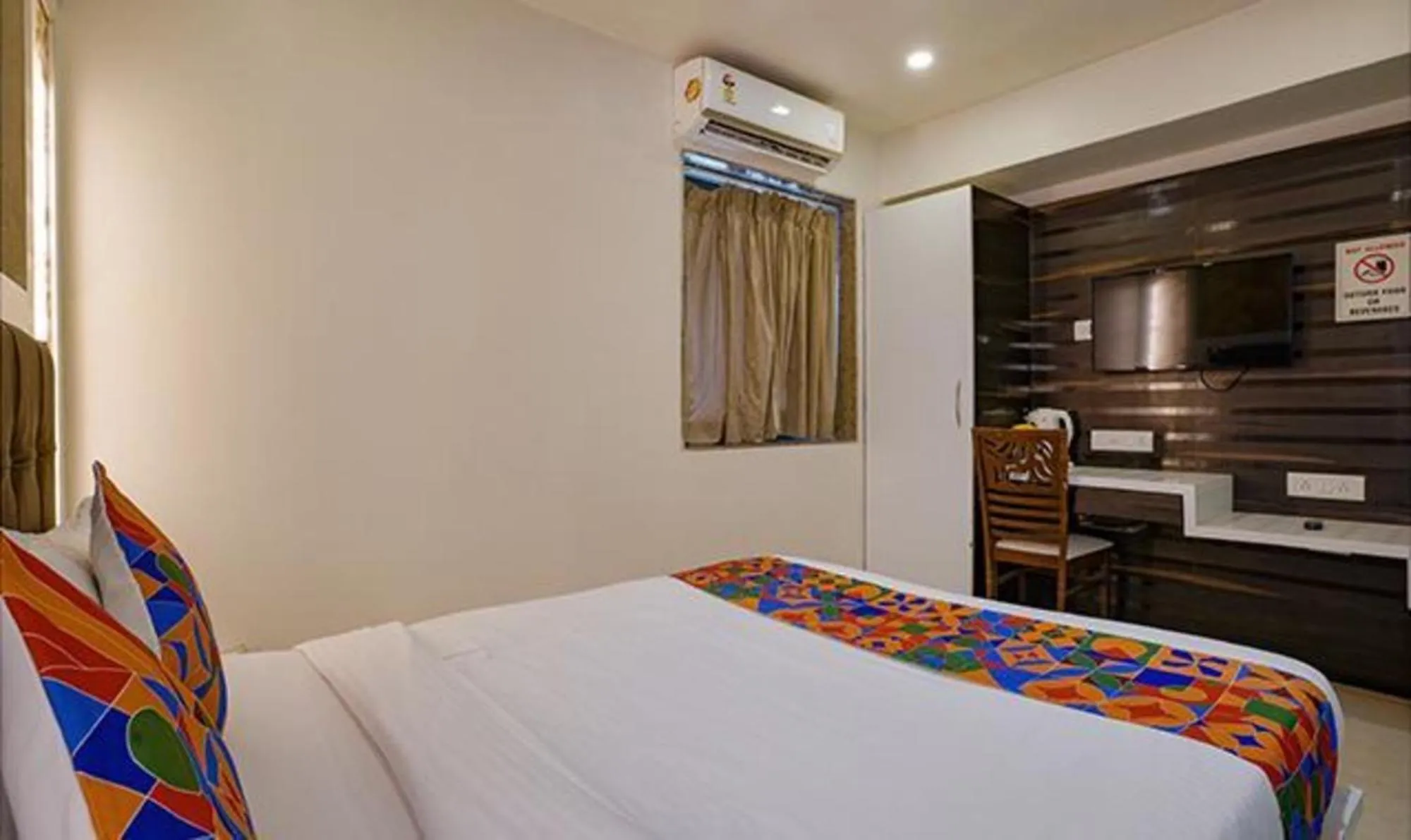 Bed in FabHotel Veera Residency - Nr Mumbai International Airport