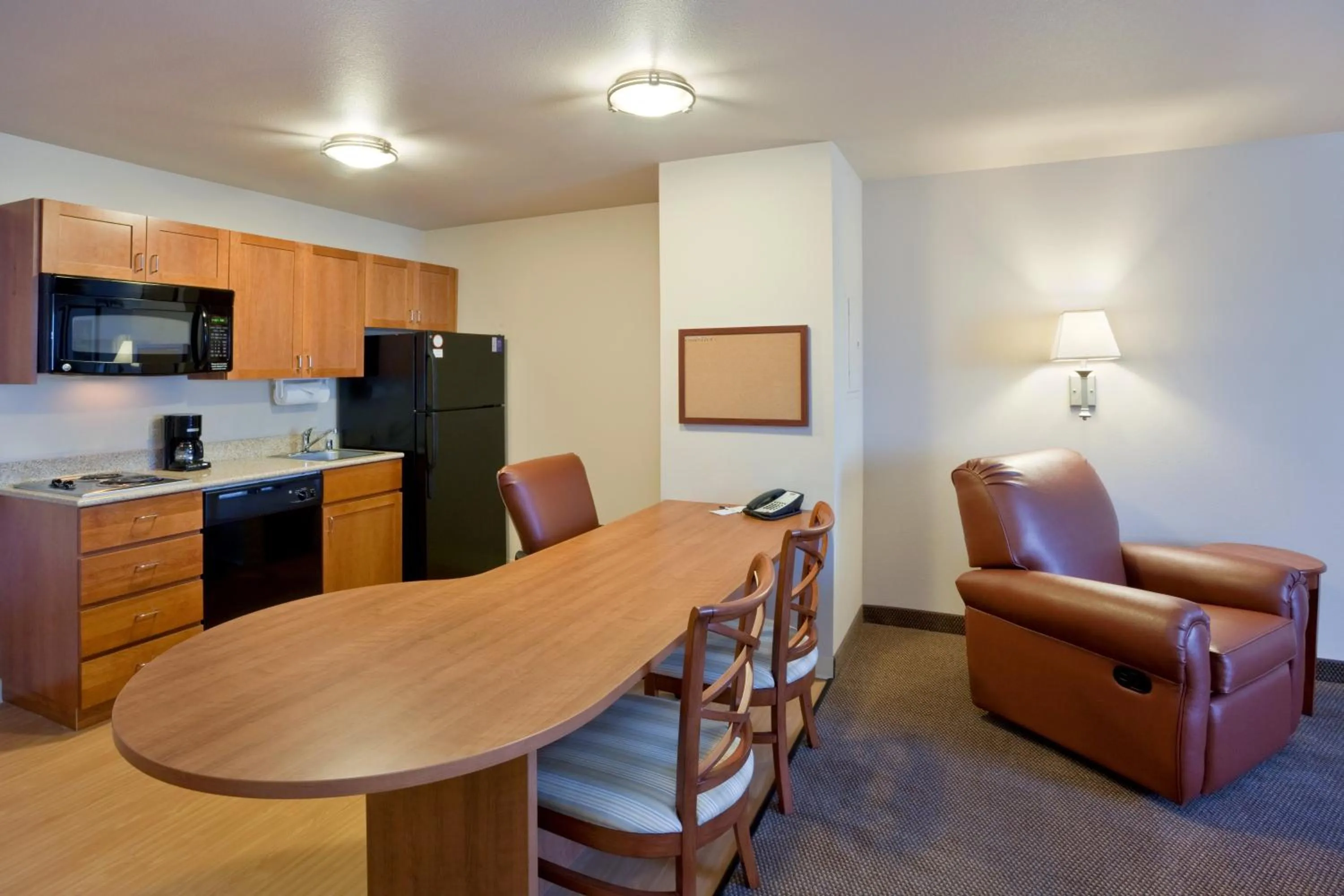 Photo of the whole room, Kitchen/Kitchenette in Candlewood Suites Lakewood, an IHG Hotel