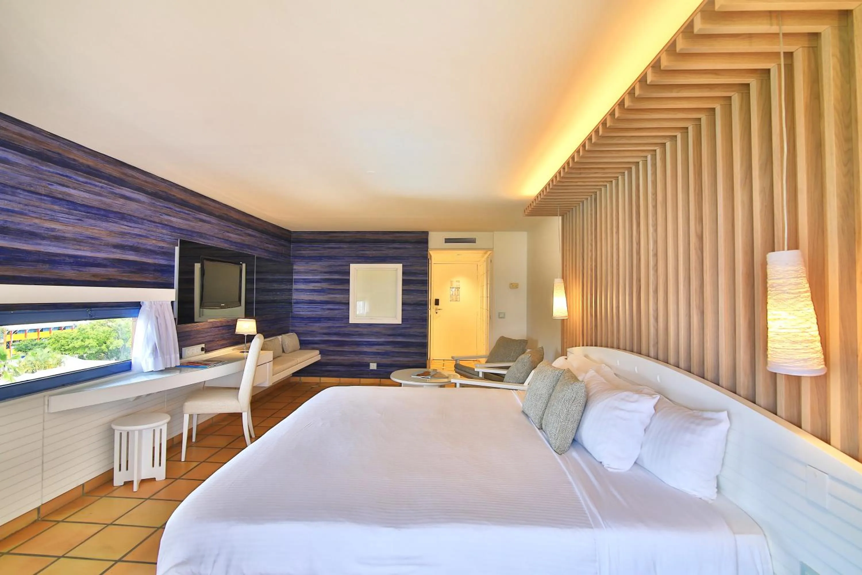 Photo of the whole room, Bed in La Creole Beach Hotel & Spa