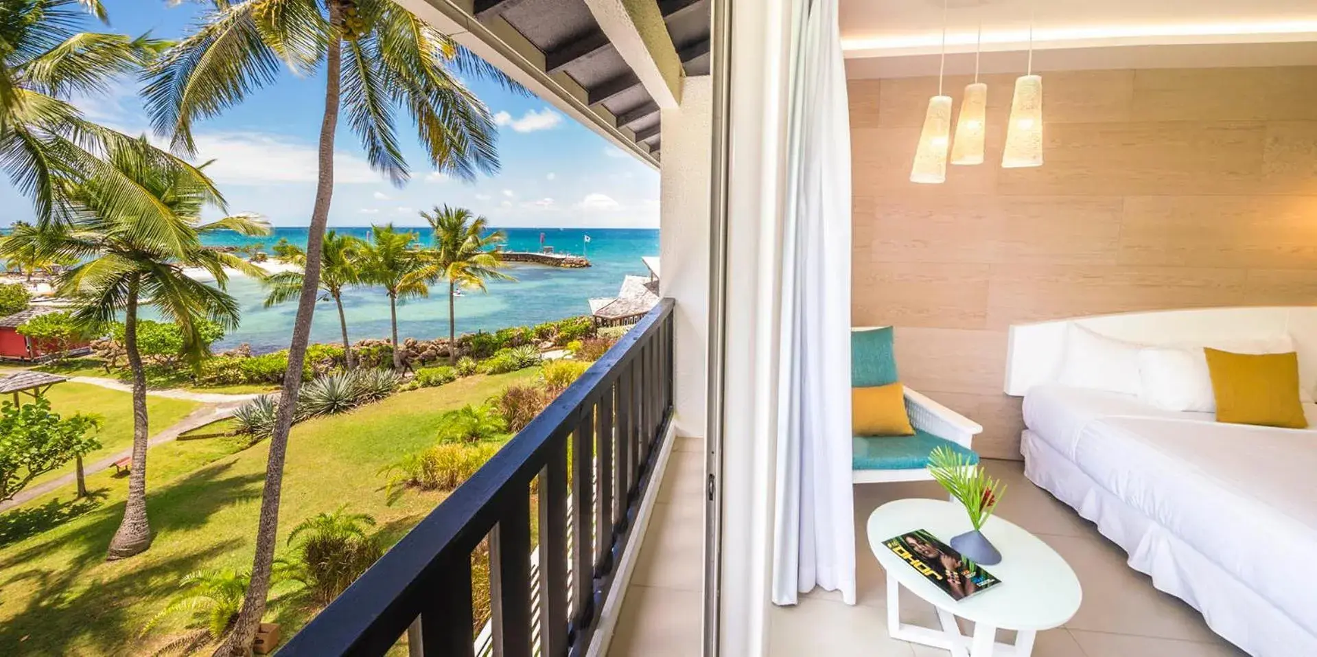 Bed in La Creole Beach Hotel & Spa Bed in La Creole Beach Hotel & Spa