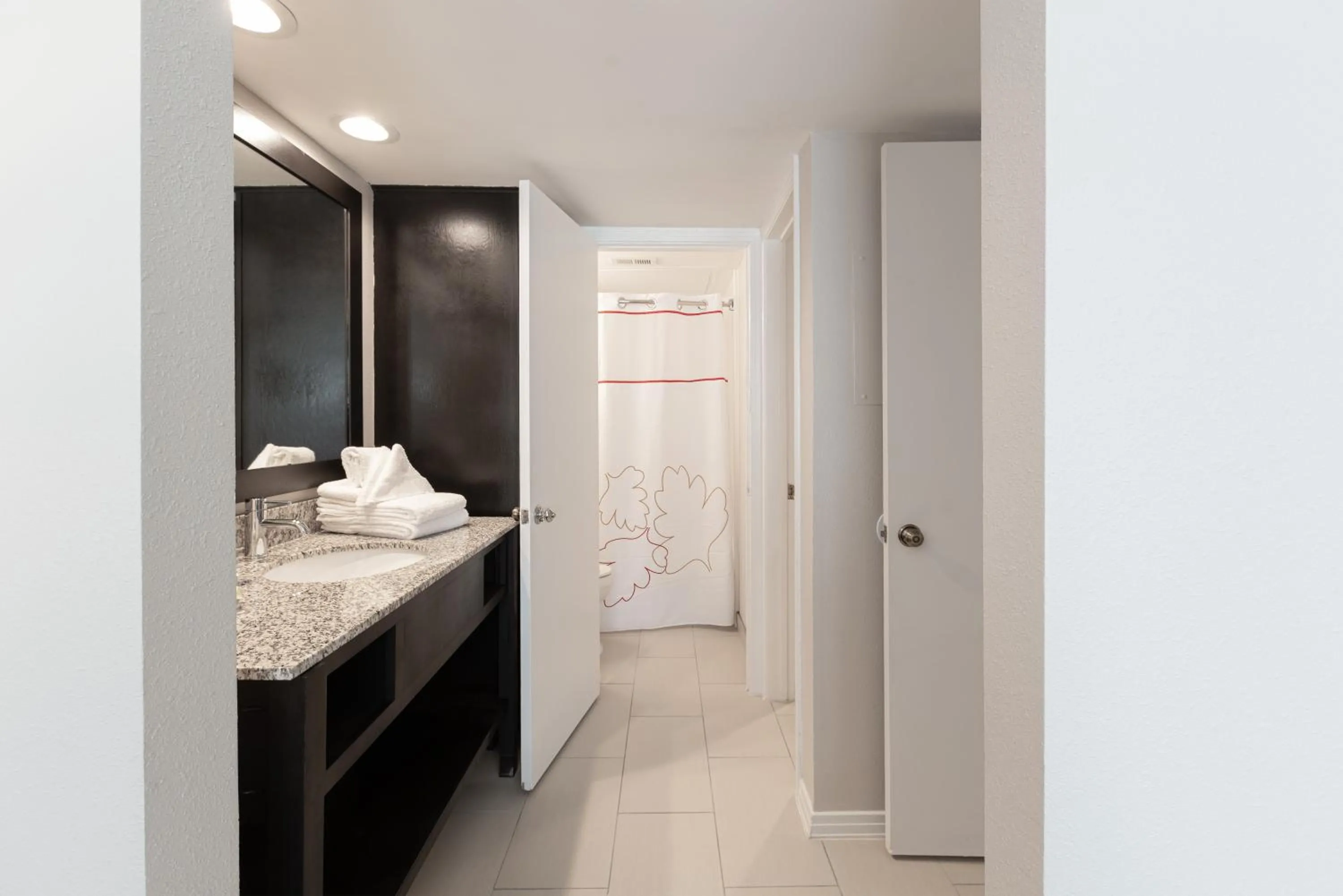 Bathroom in Value Suites Extended Stay - Arlington