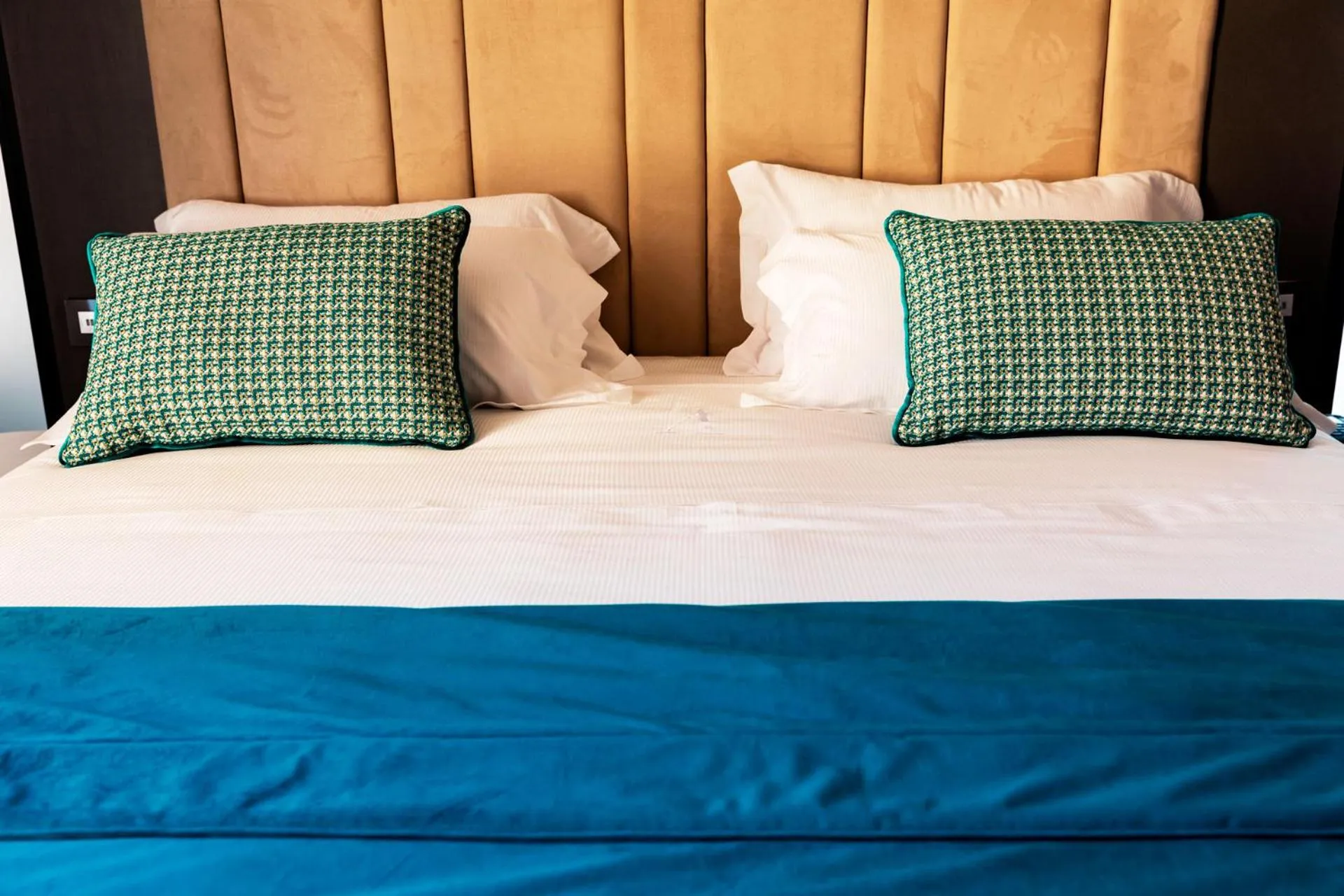 Bed in Amadomus Luxury Suites