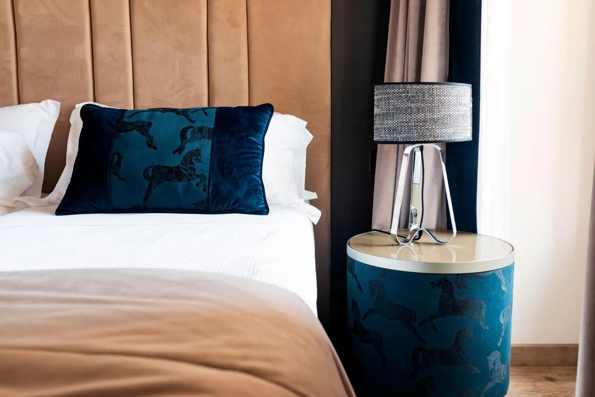 Bed in Amadomus Luxury Suites