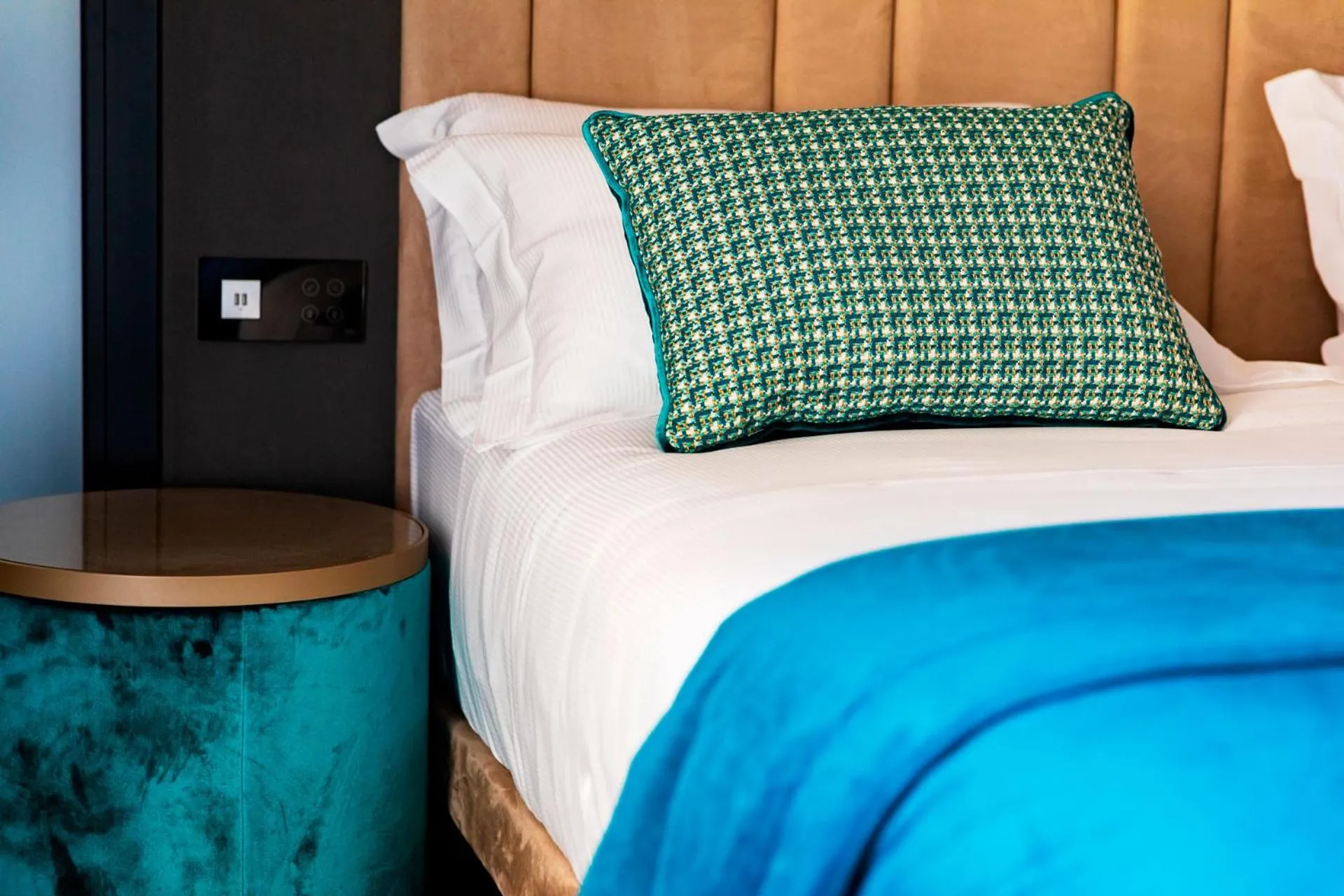 Bed in Amadomus Luxury Suites