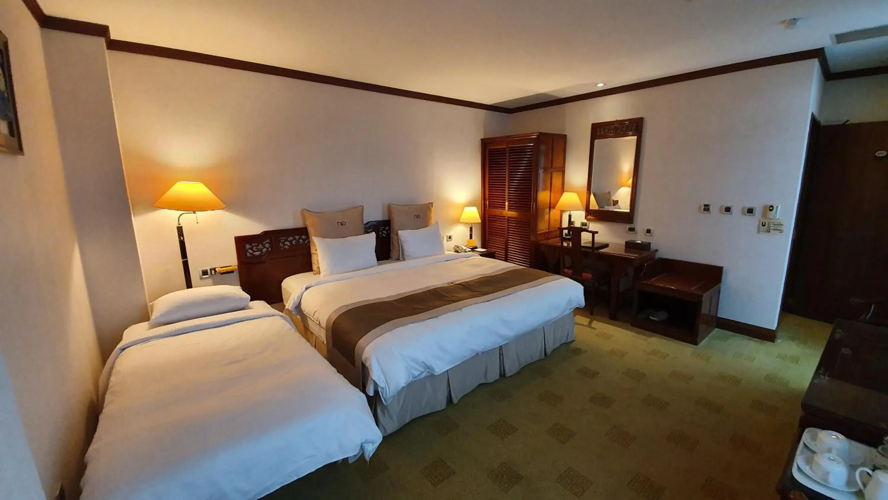 Bed in Rich Garden Hotel Bed in Rich Garden Hotel