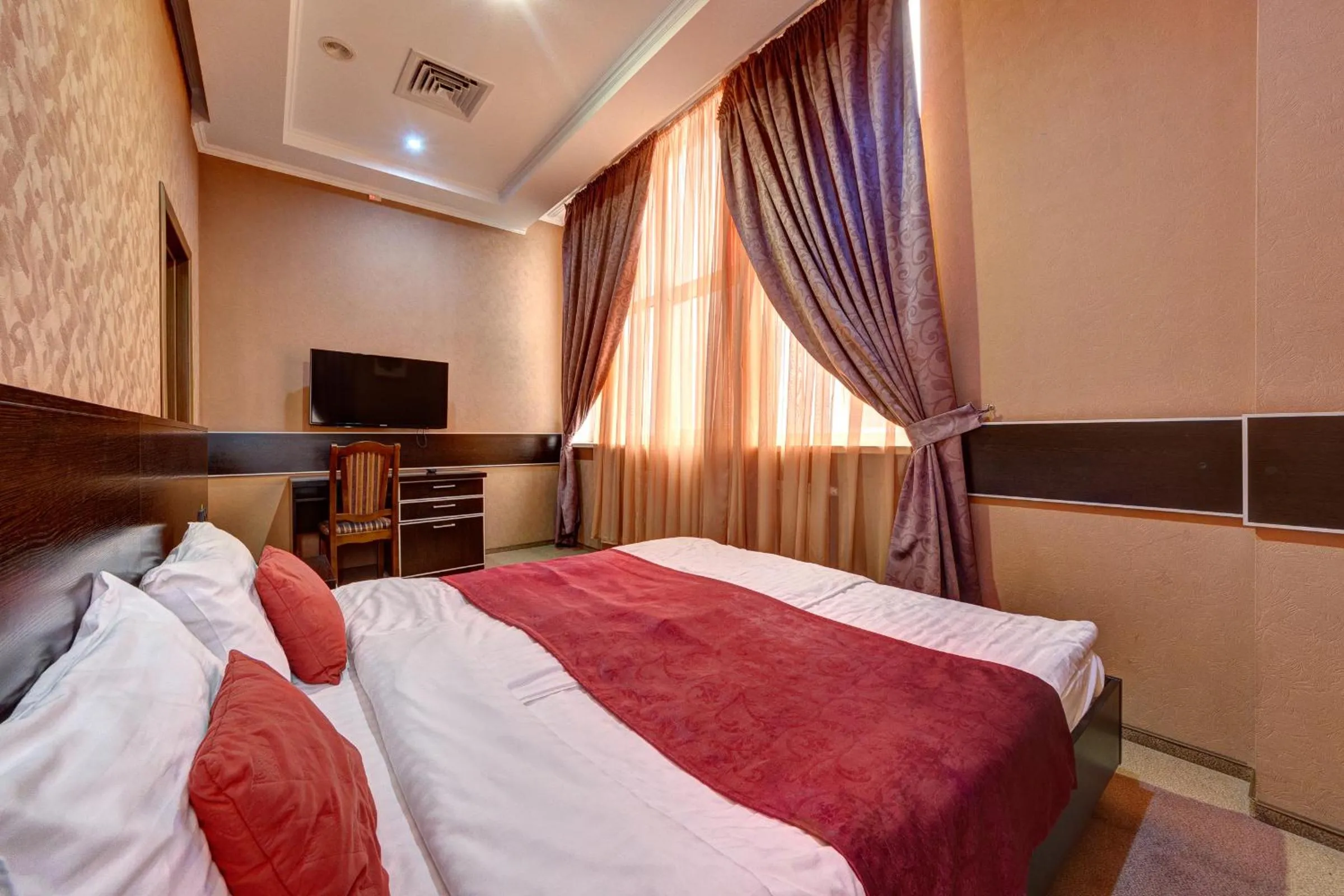 Bed in Terra Nova Sport&Spa Hotel