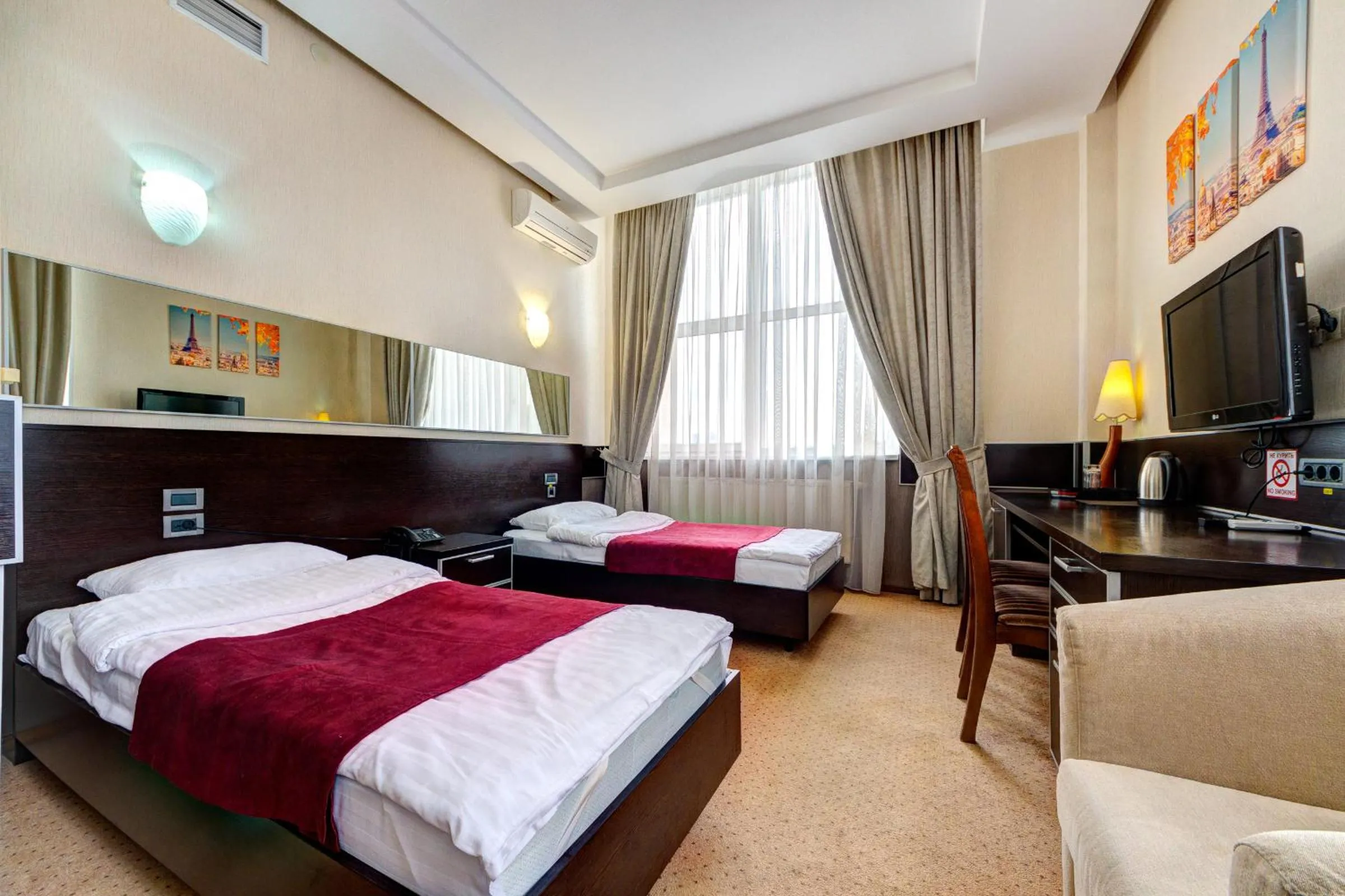 Bed in Terra Nova Sport&Spa Hotel