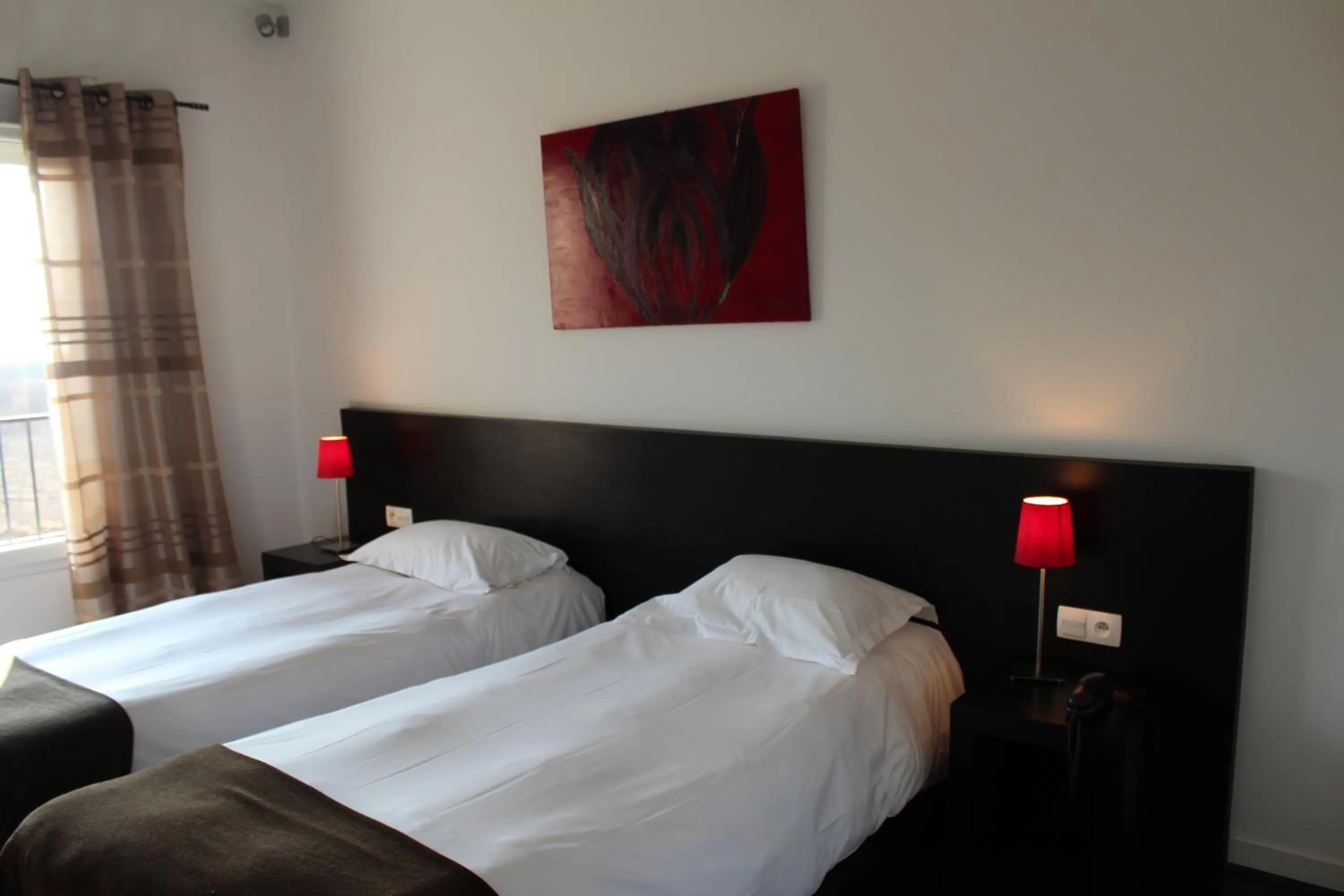 Bed in Hôtel Le Domaine des Vignes Ampuis Lyon Sud Vienne