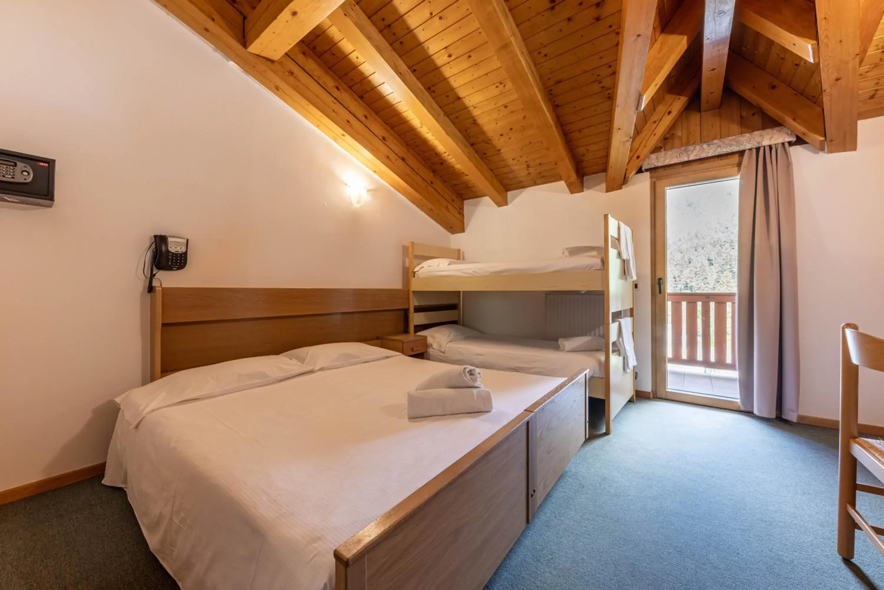 Quadruple Room in Hotel Laste' Quadruple Room in Hotel Laste'