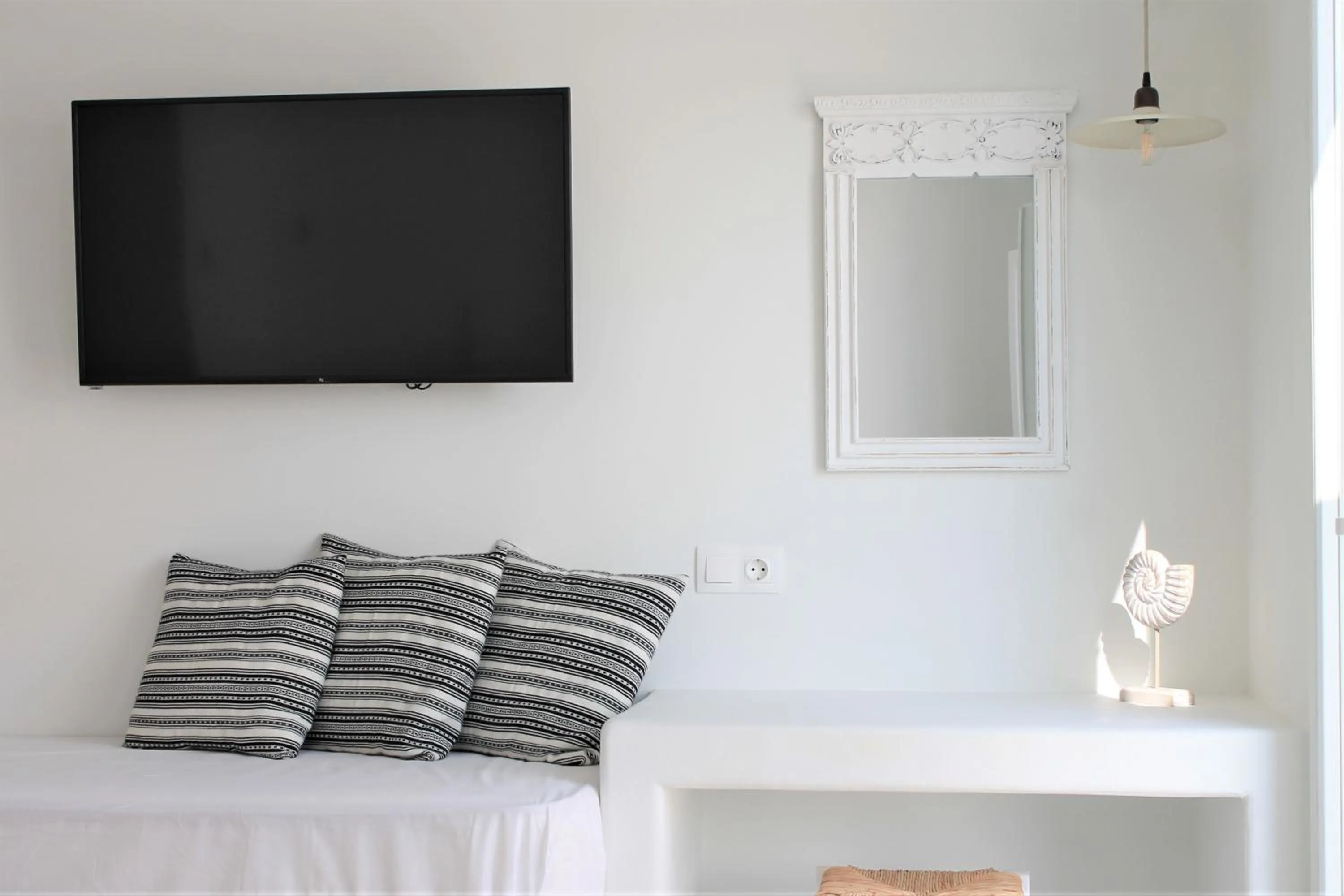 Bed in Stegna Akti Luxury Suites