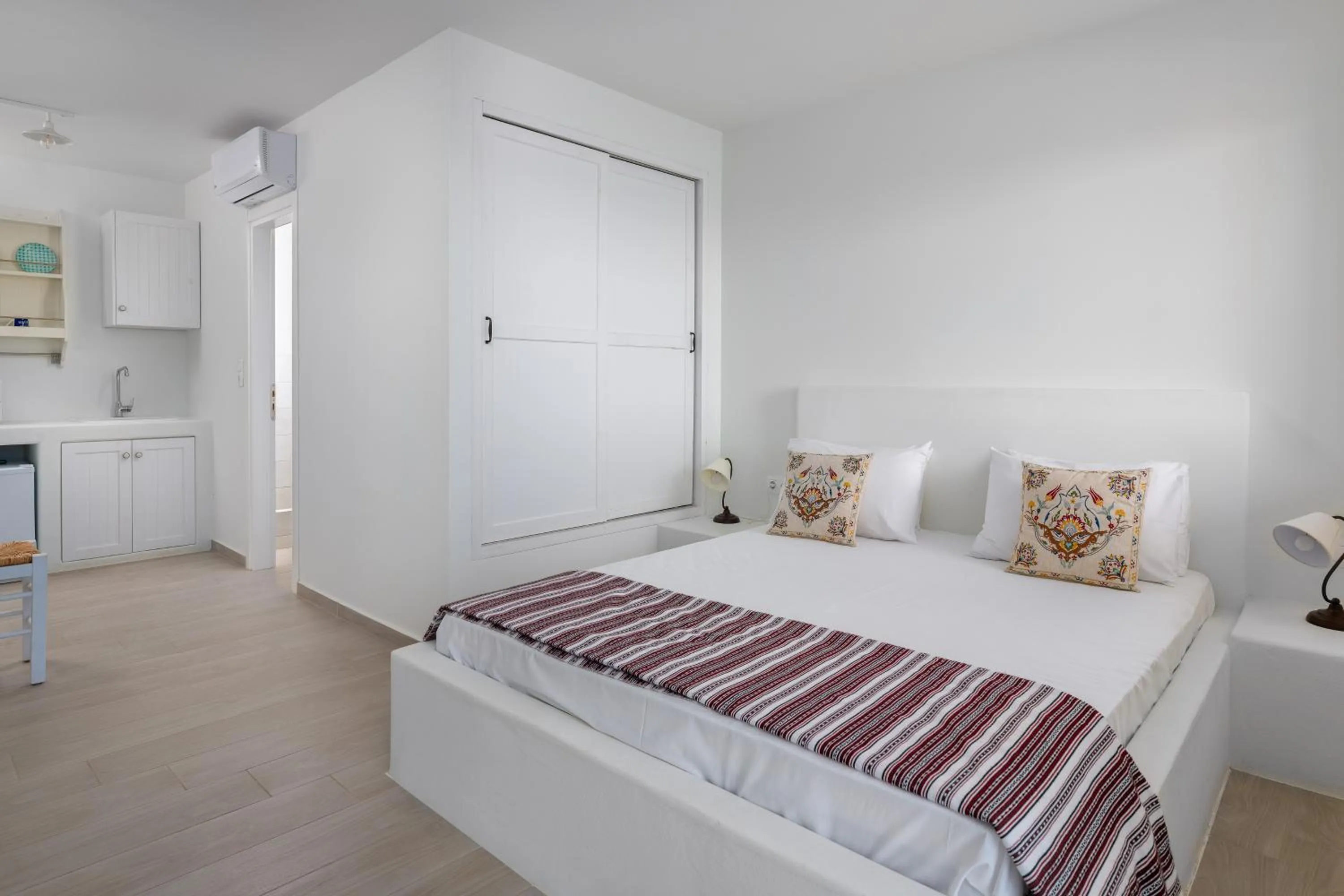 Bed in Stegna Akti Luxury Suites