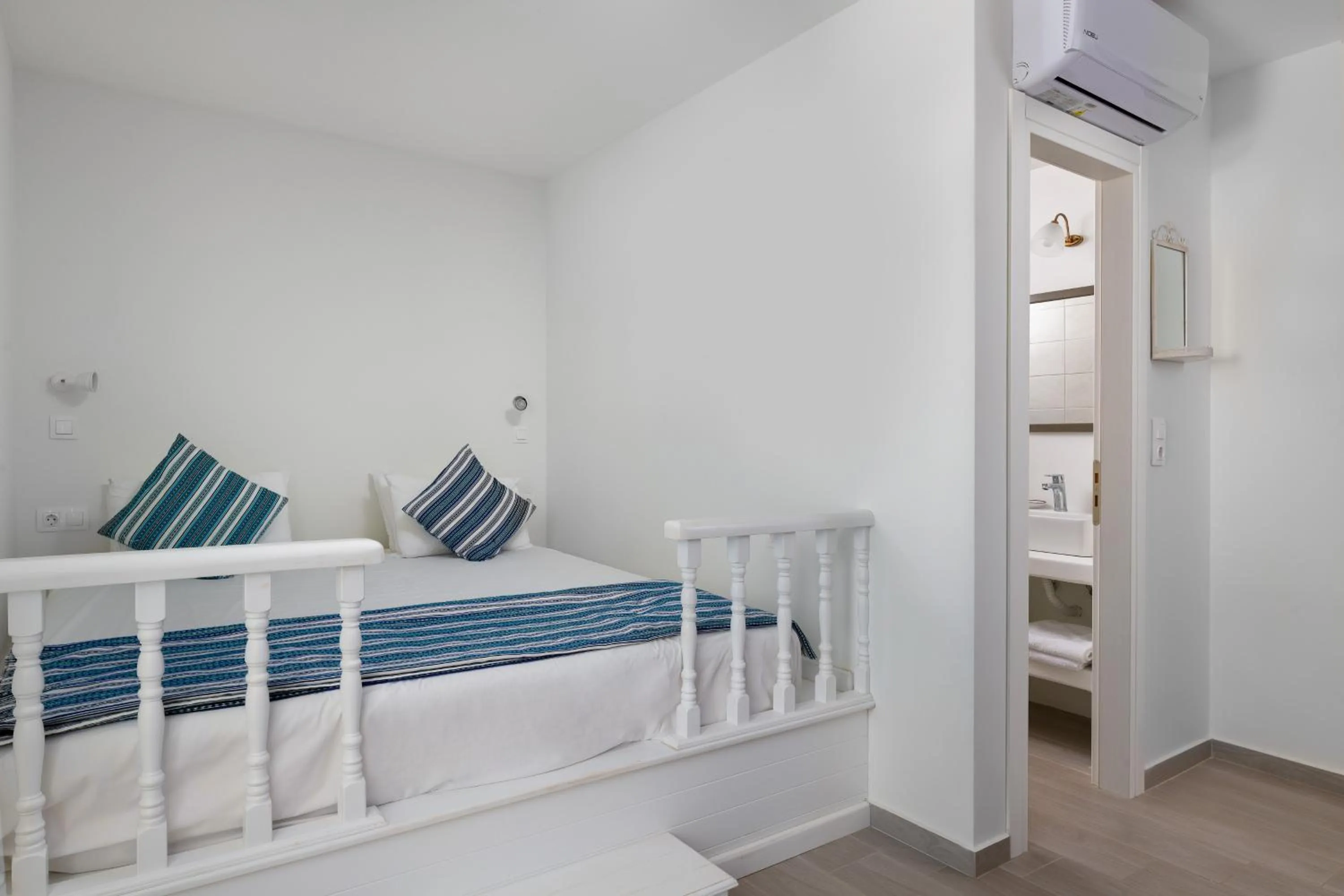 Bed in Stegna Akti Luxury Suites