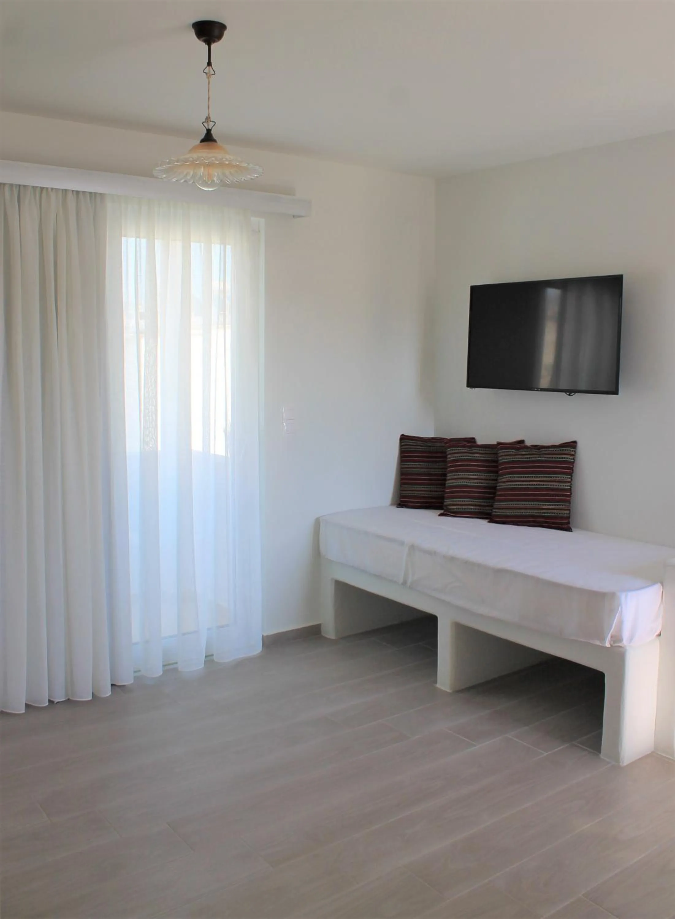 TV and multimedia, Bed in Stegna Akti Luxury Suites