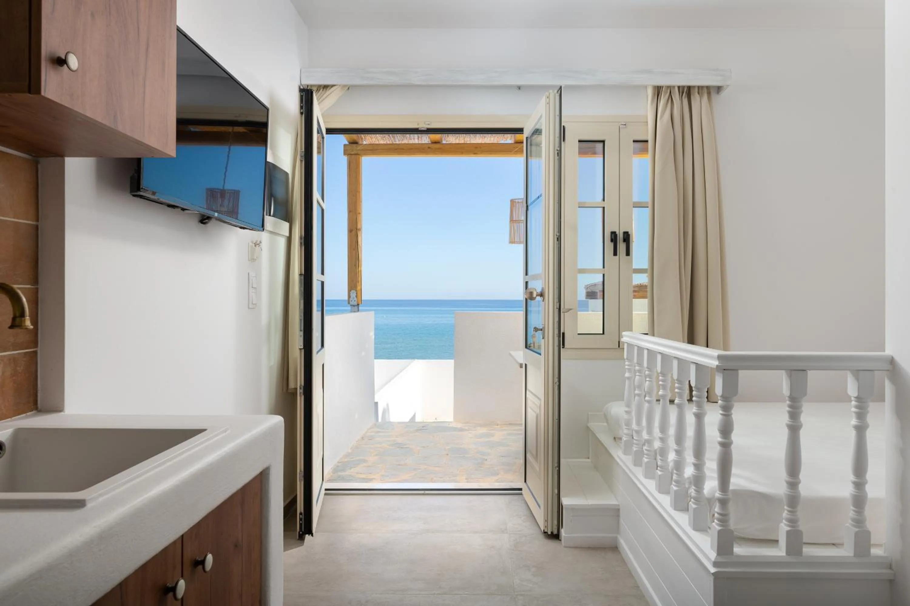 Bed in Stegna Akti Luxury Suites