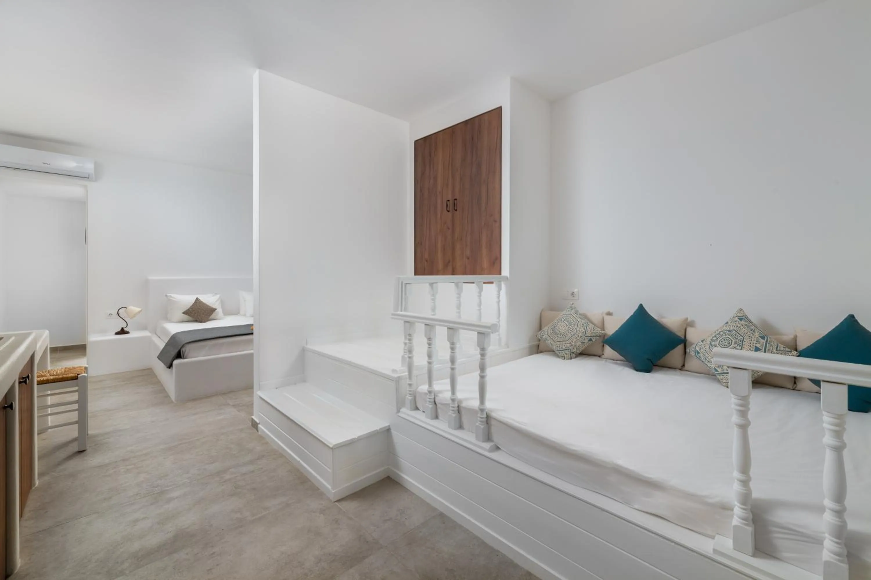 Bed in Stegna Akti Luxury Suites