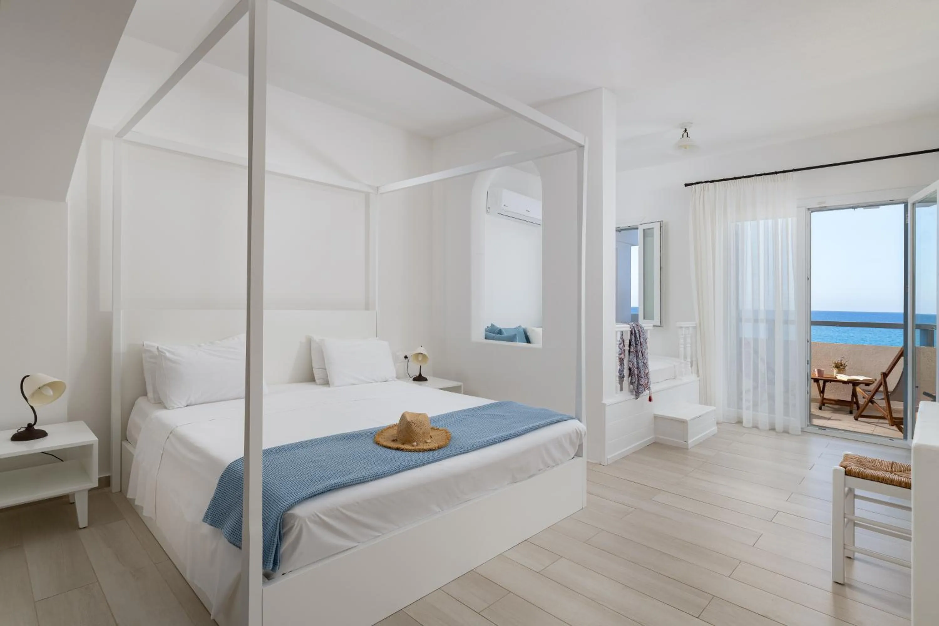 Bed in Stegna Akti Luxury Suites