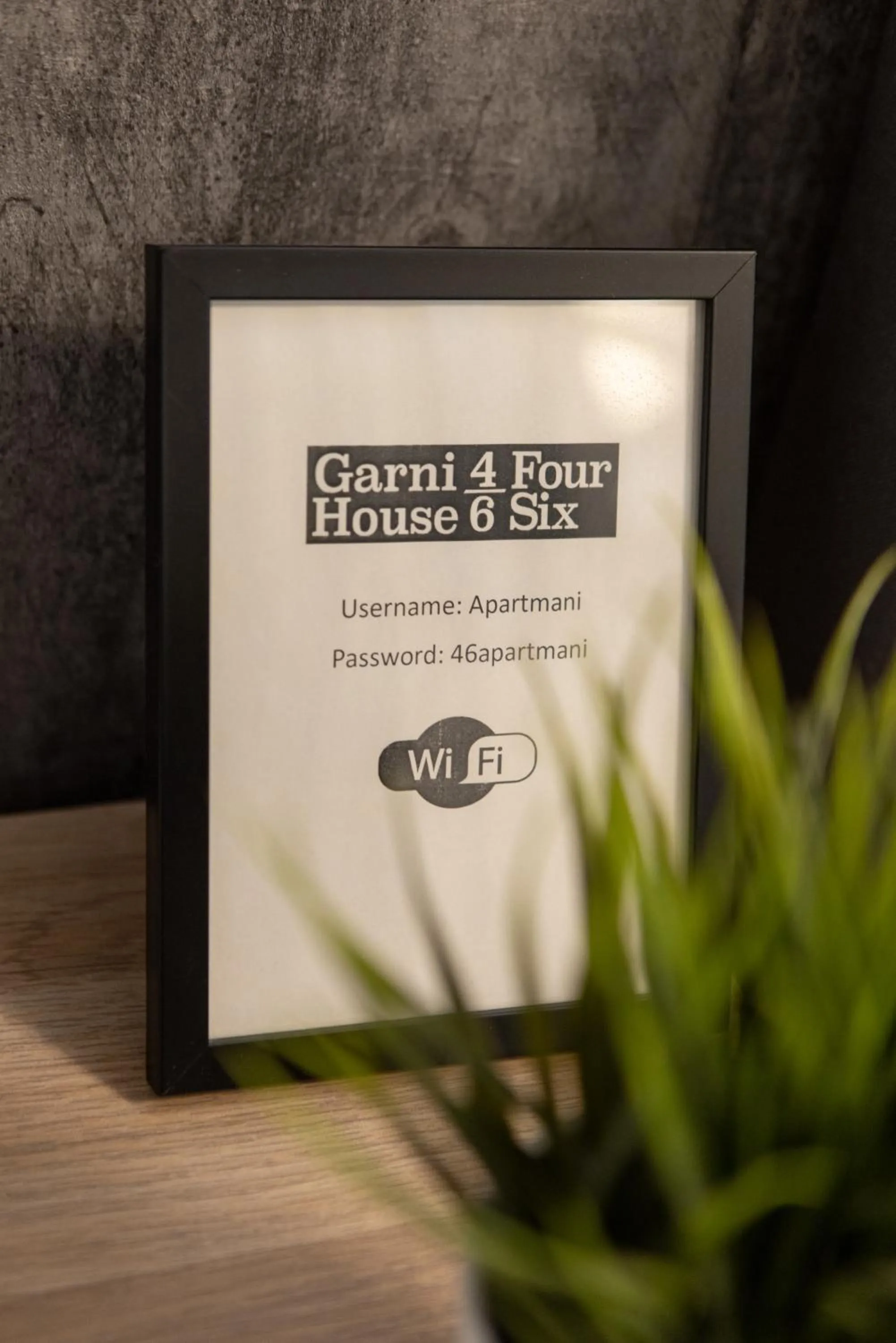 Property logo or sign in Garni House 46 Plus