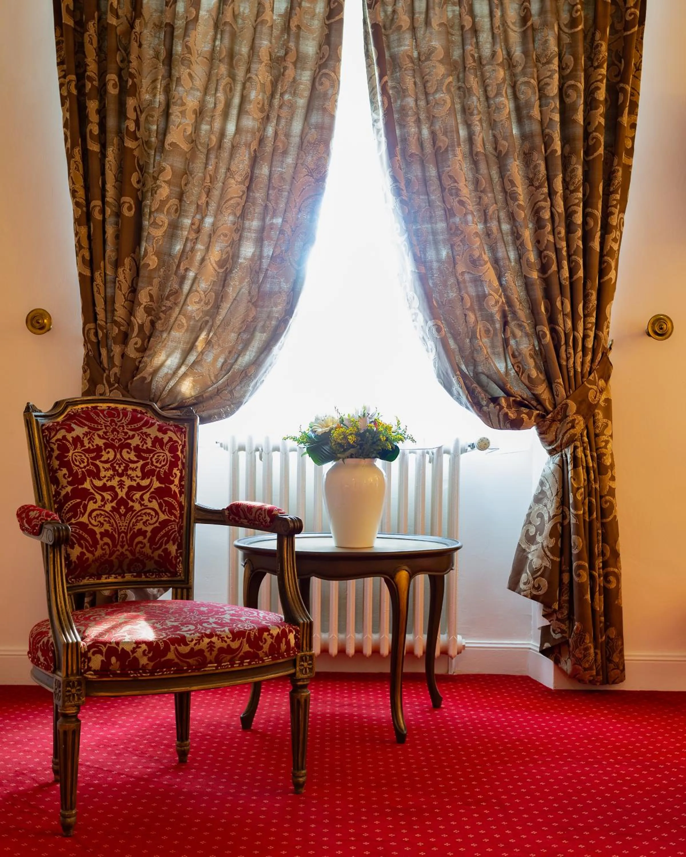 Seating area in Hotel Restaurant Le Centenaire