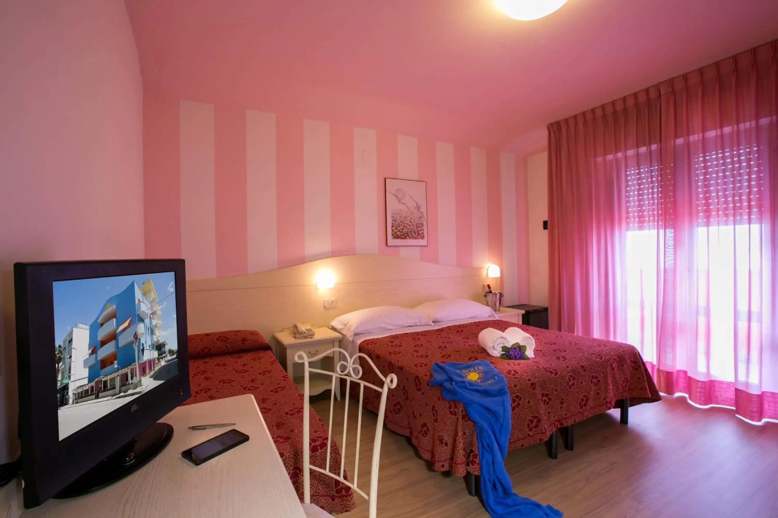 Triple Room with Balcony in Hotel Le Soleil Triple Room with Balcony in Hotel Le Soleil