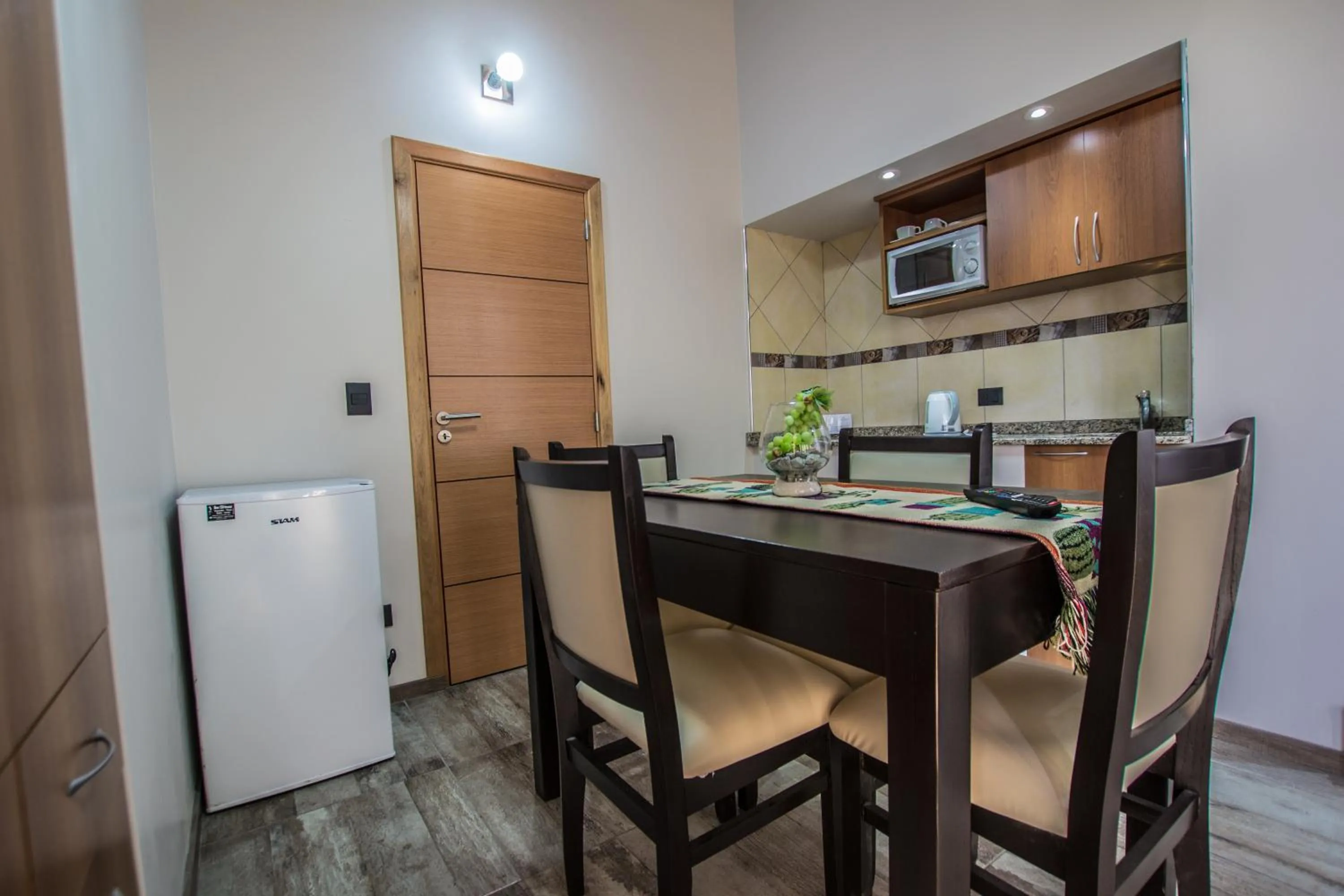 Kitchen or kitchenette in Bahia Paraiso Apart & Suites