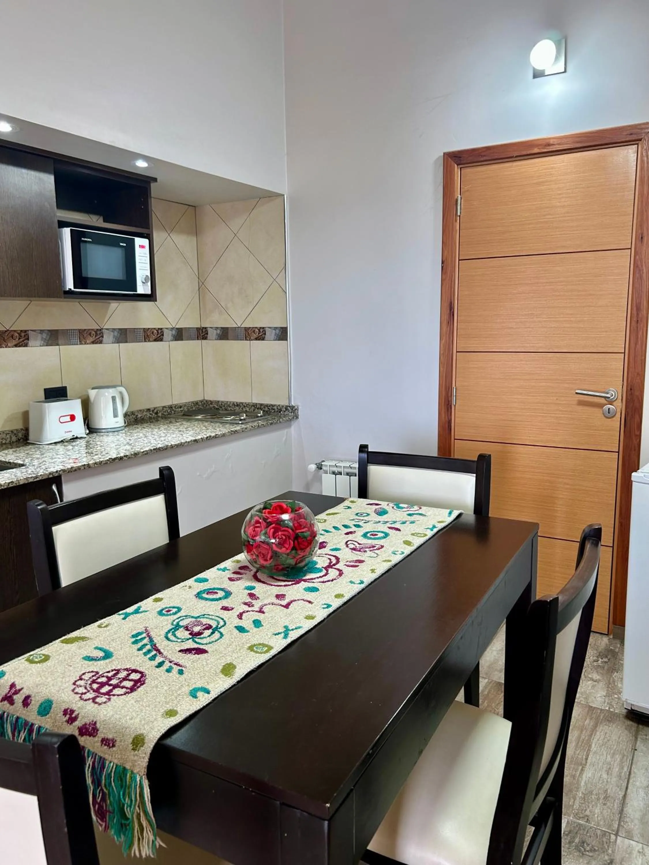 Kitchen or kitchenette in Bahia Paraiso Apart & Suites