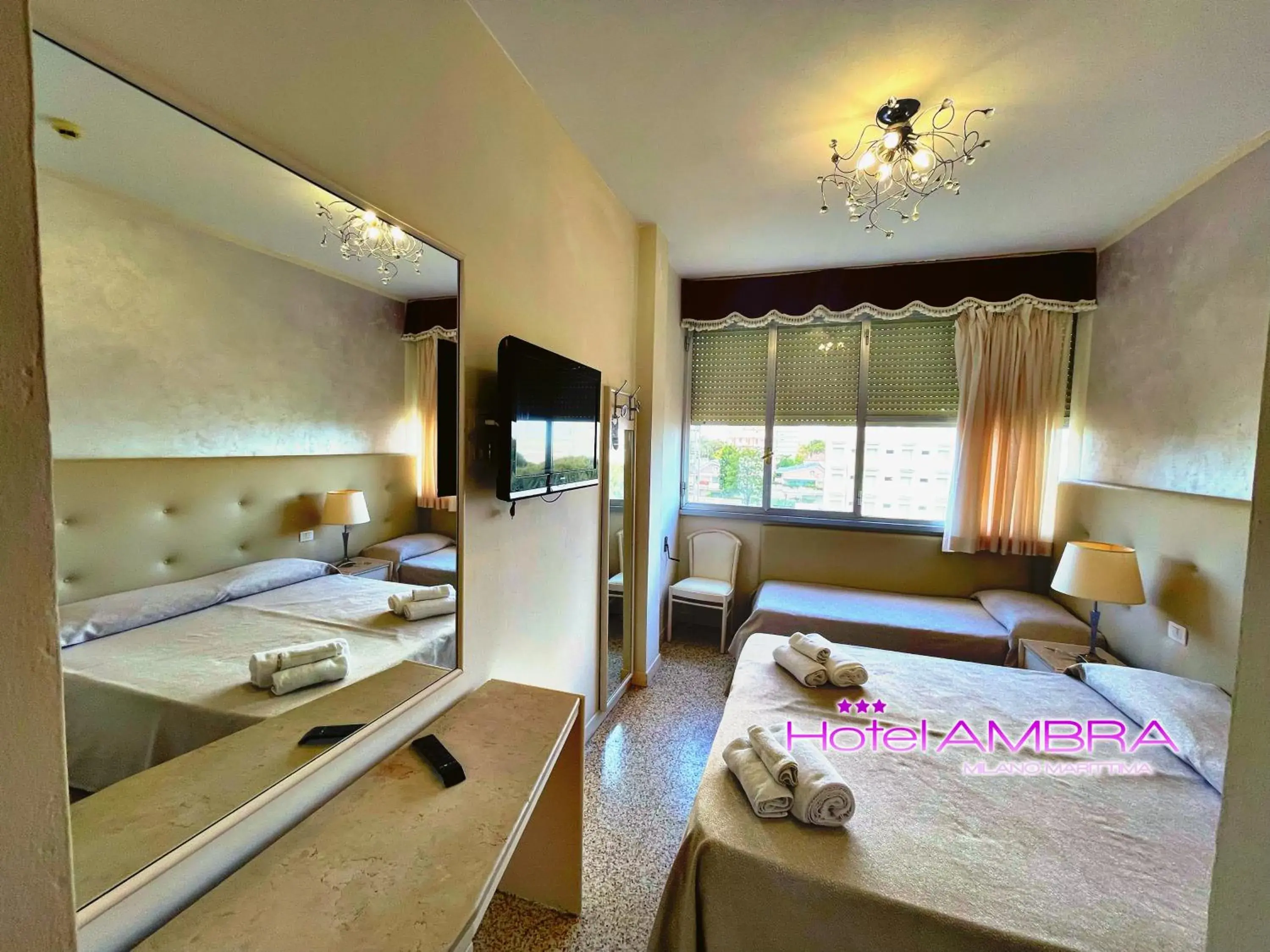 Bedroom, Bed in HOTEL AMBRA - Fronte Mare - Vicinissimi al Centro Bedroom, Bed in HOTEL AMBRA - Fronte Mare - Vicinissimi al Centro