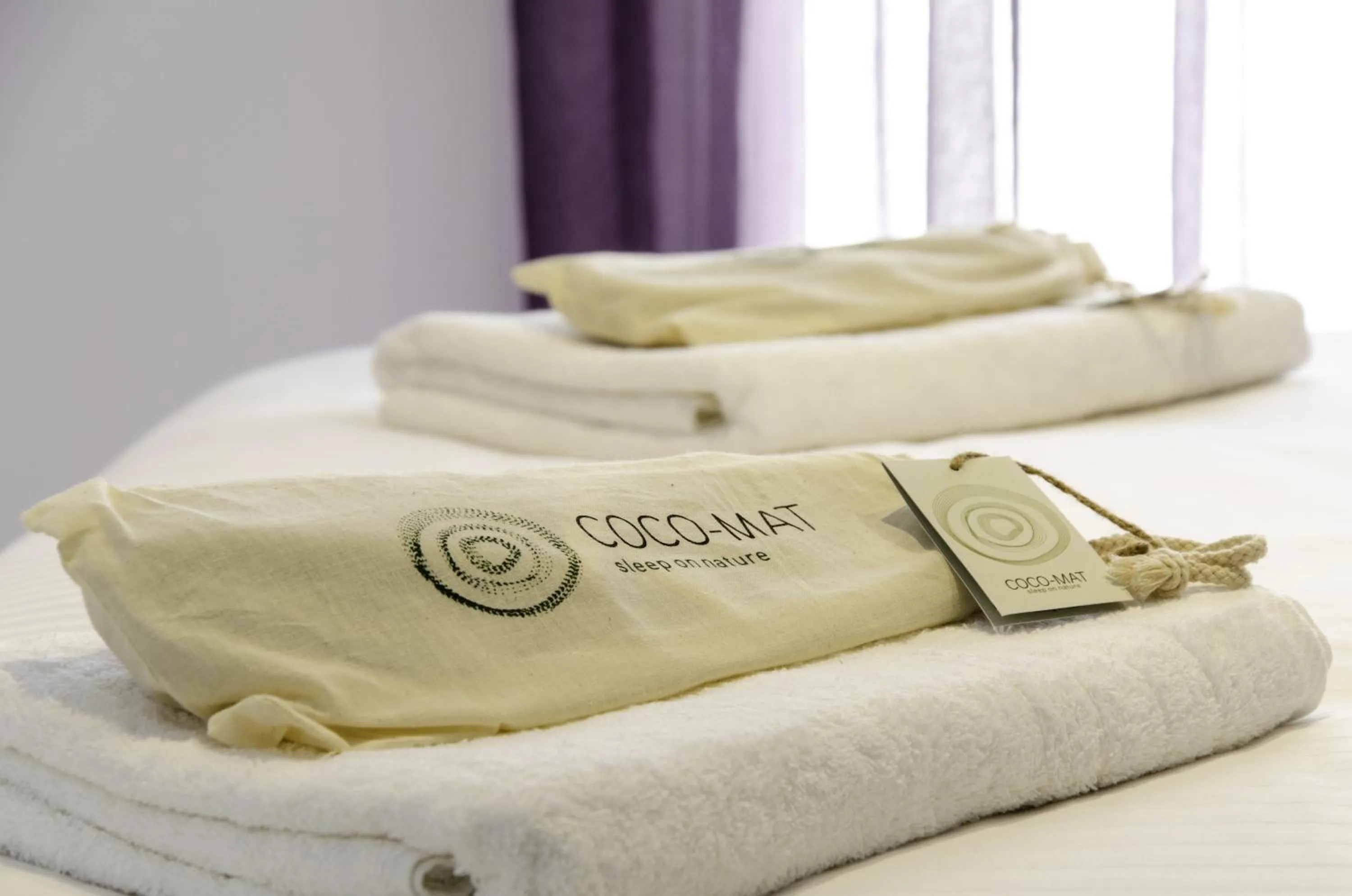 Bed in Talos Luxury Suites