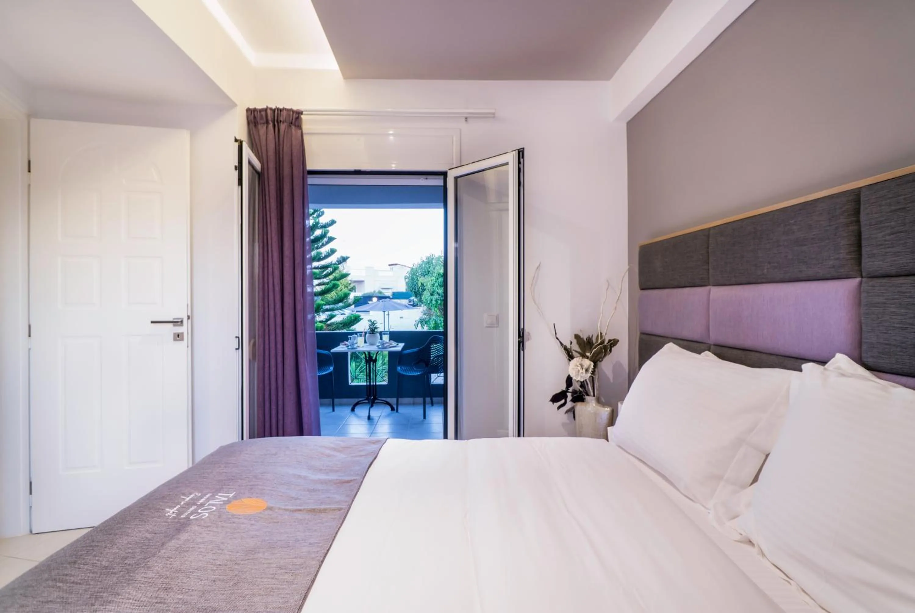 Bed in Talos Luxury Suites