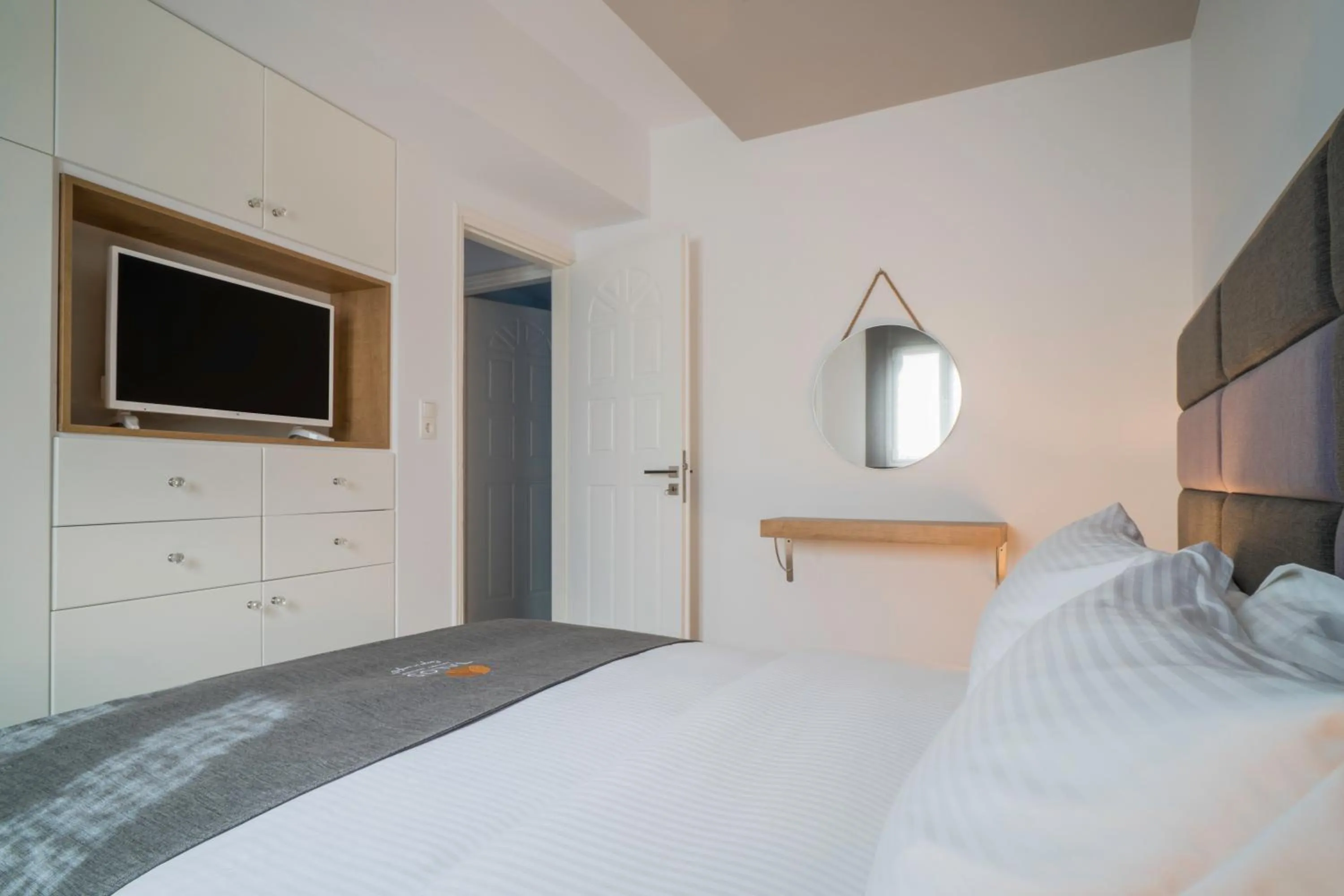 Bed in Talos Luxury Suites