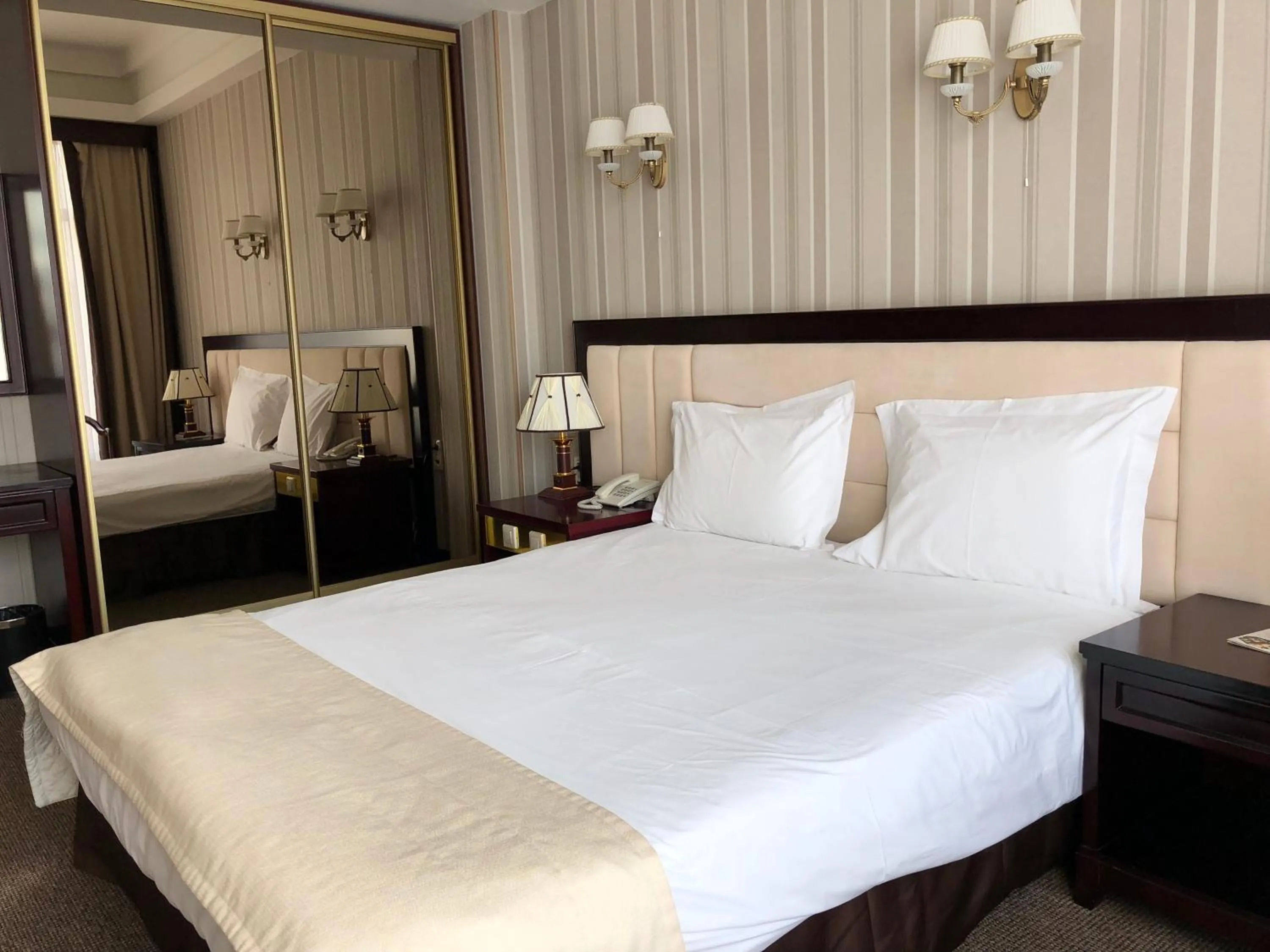 Bed in Sofievsky Posad Hotel