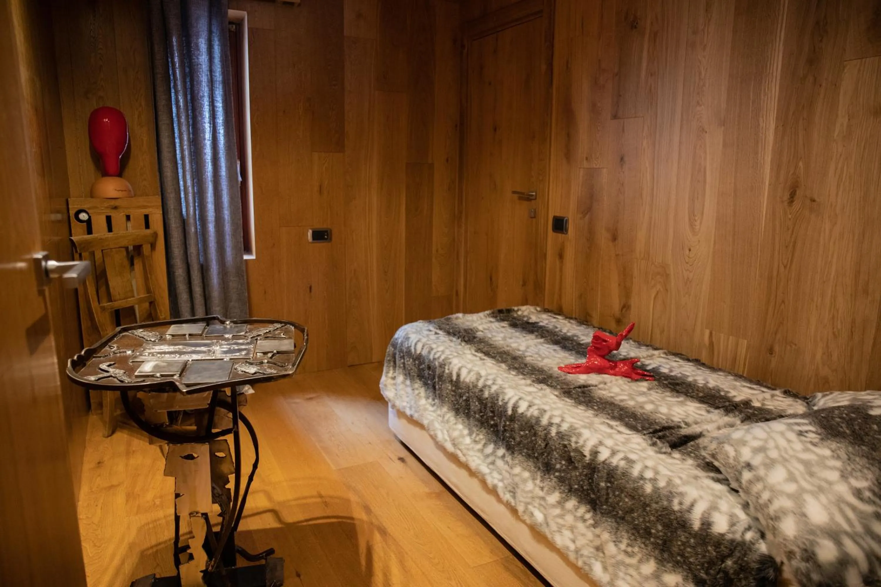 Bed in Art Hotel Grivola