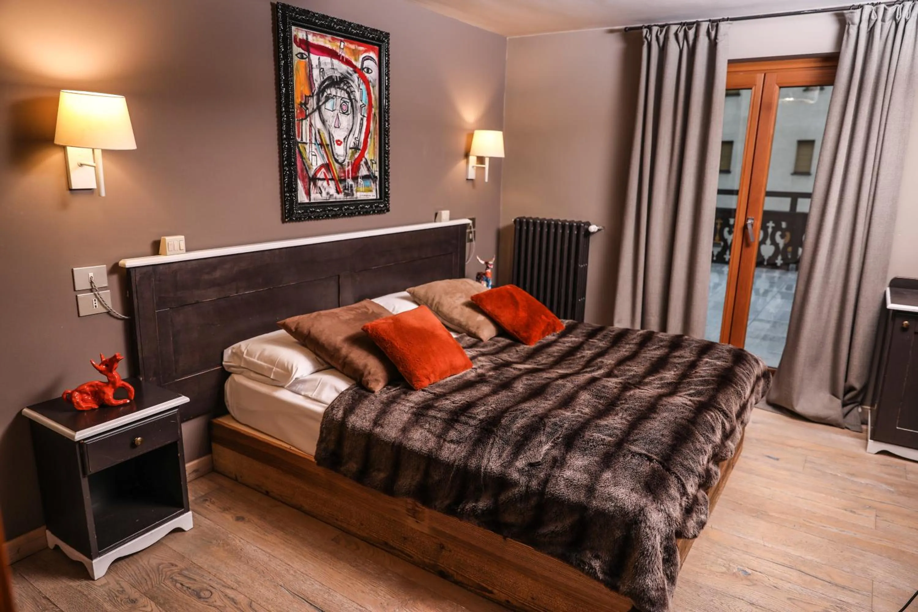 Bed in Art Hotel Grivola