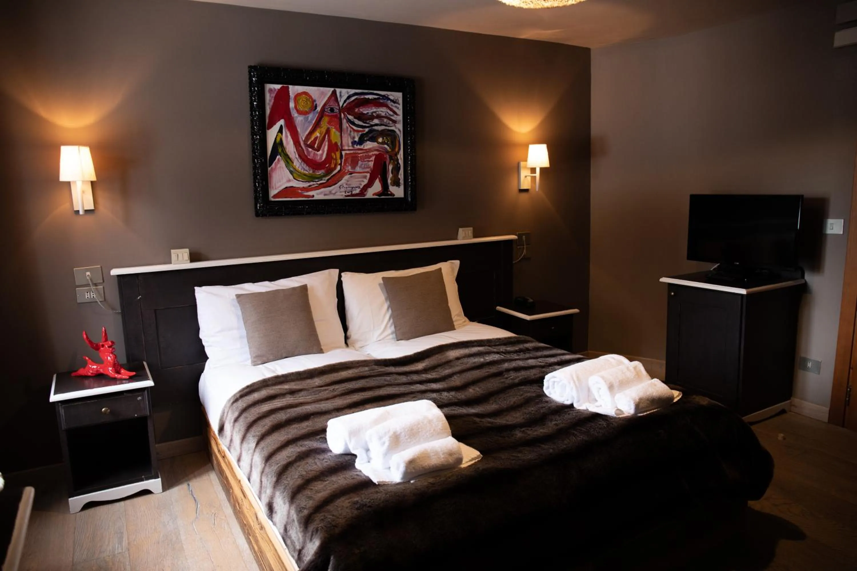 Bed in Art Hotel Grivola