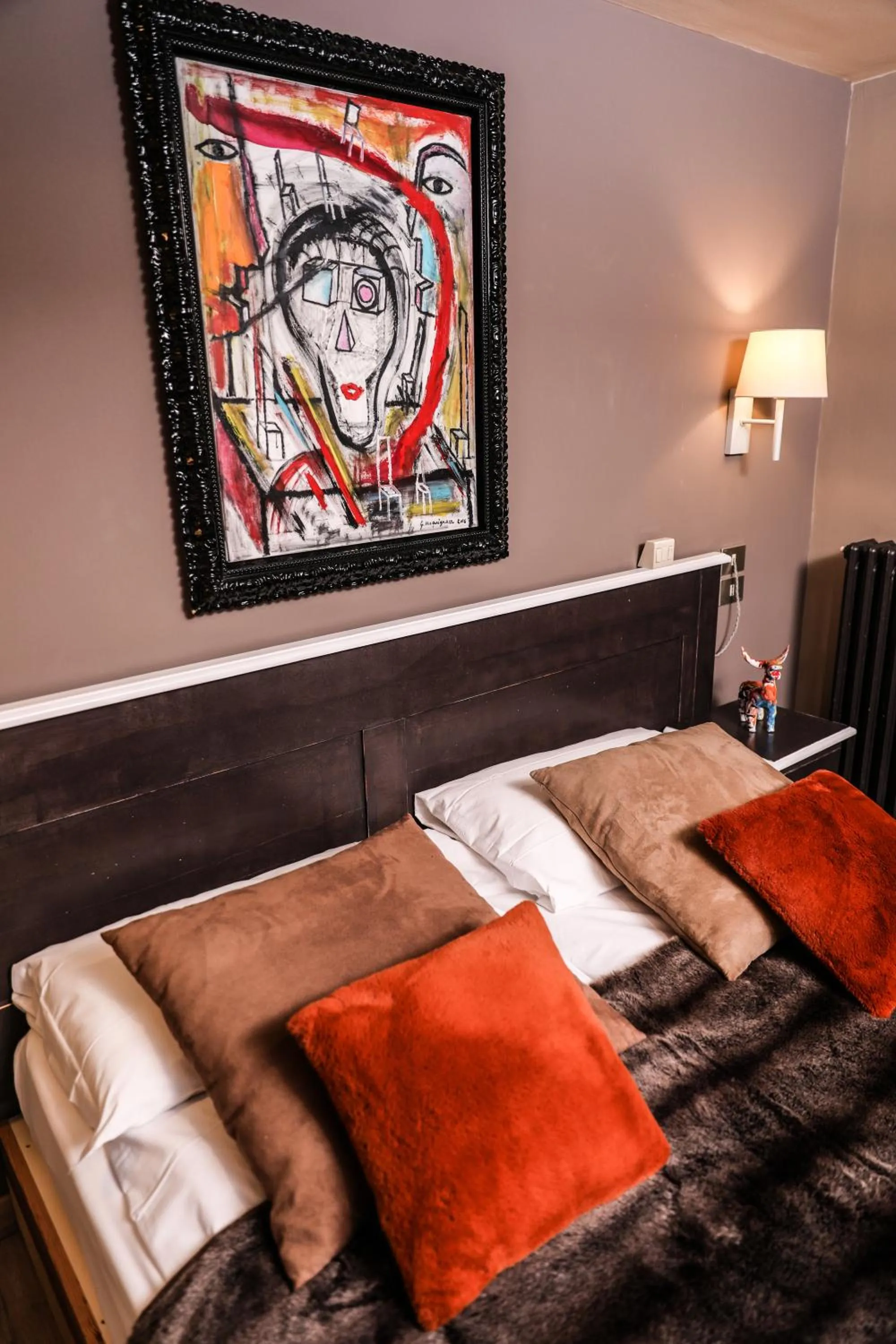 Bed in Art Hotel Grivola