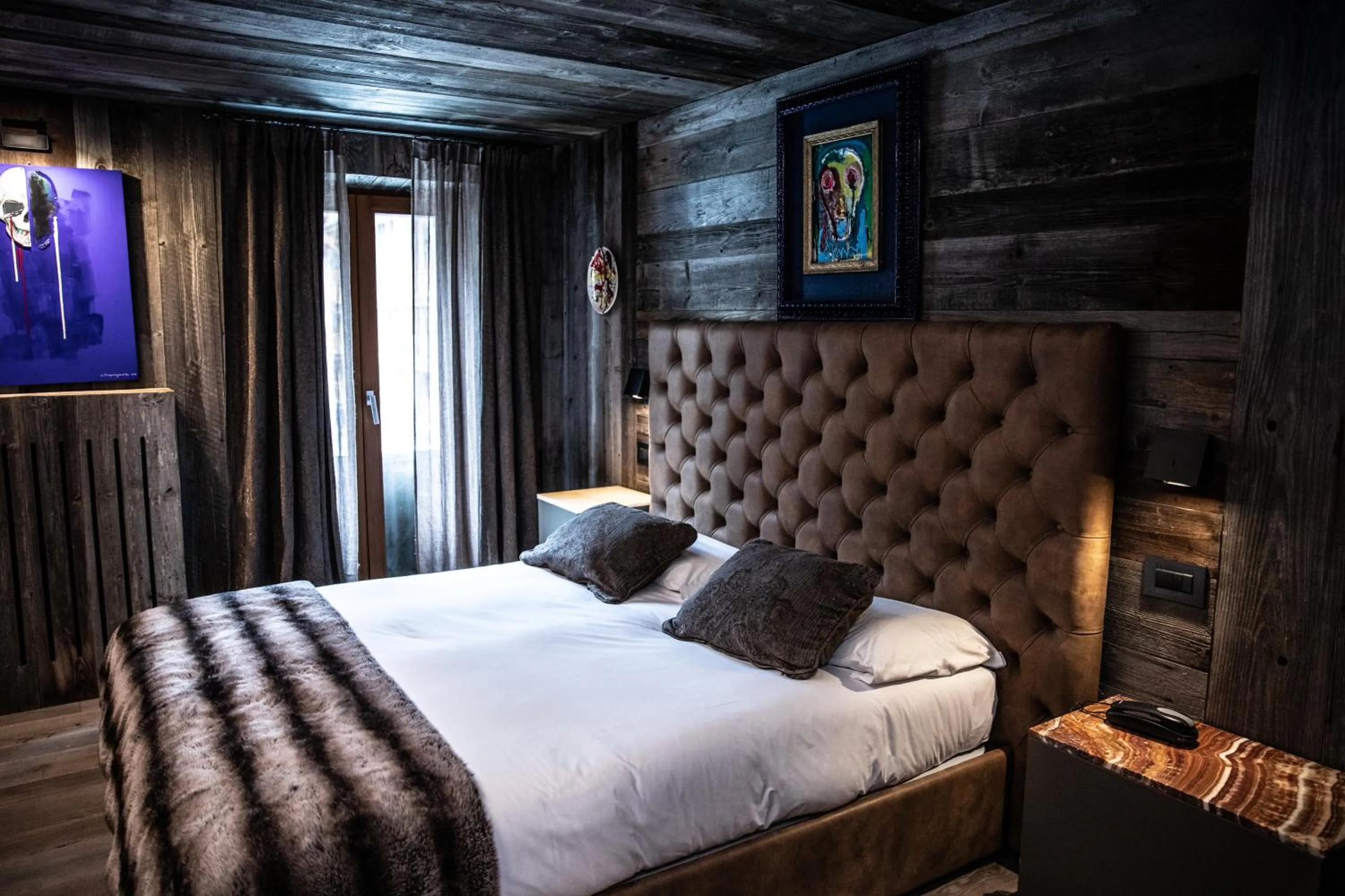 Bed in Art Hotel Grivola