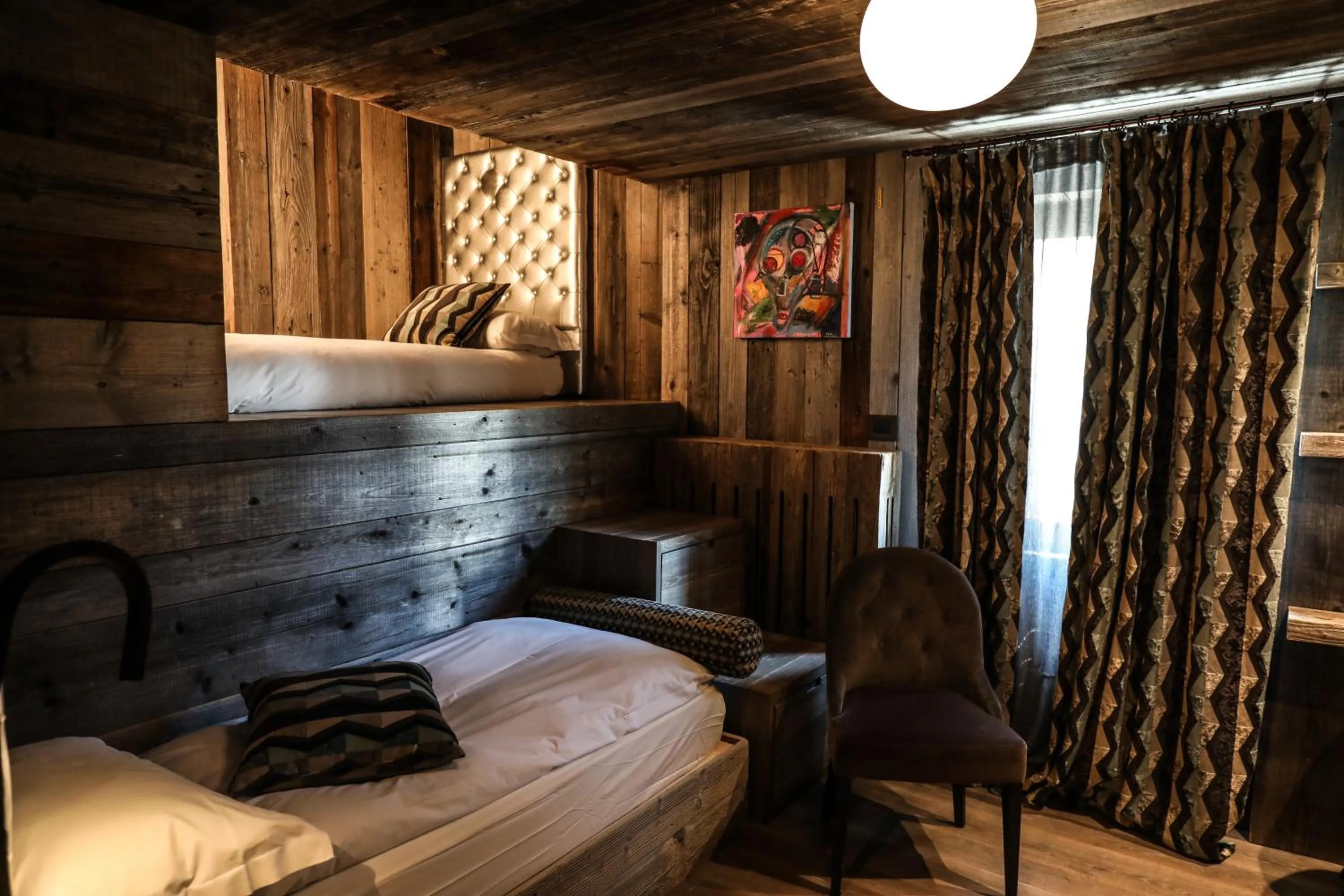 Bed in Art Hotel Grivola