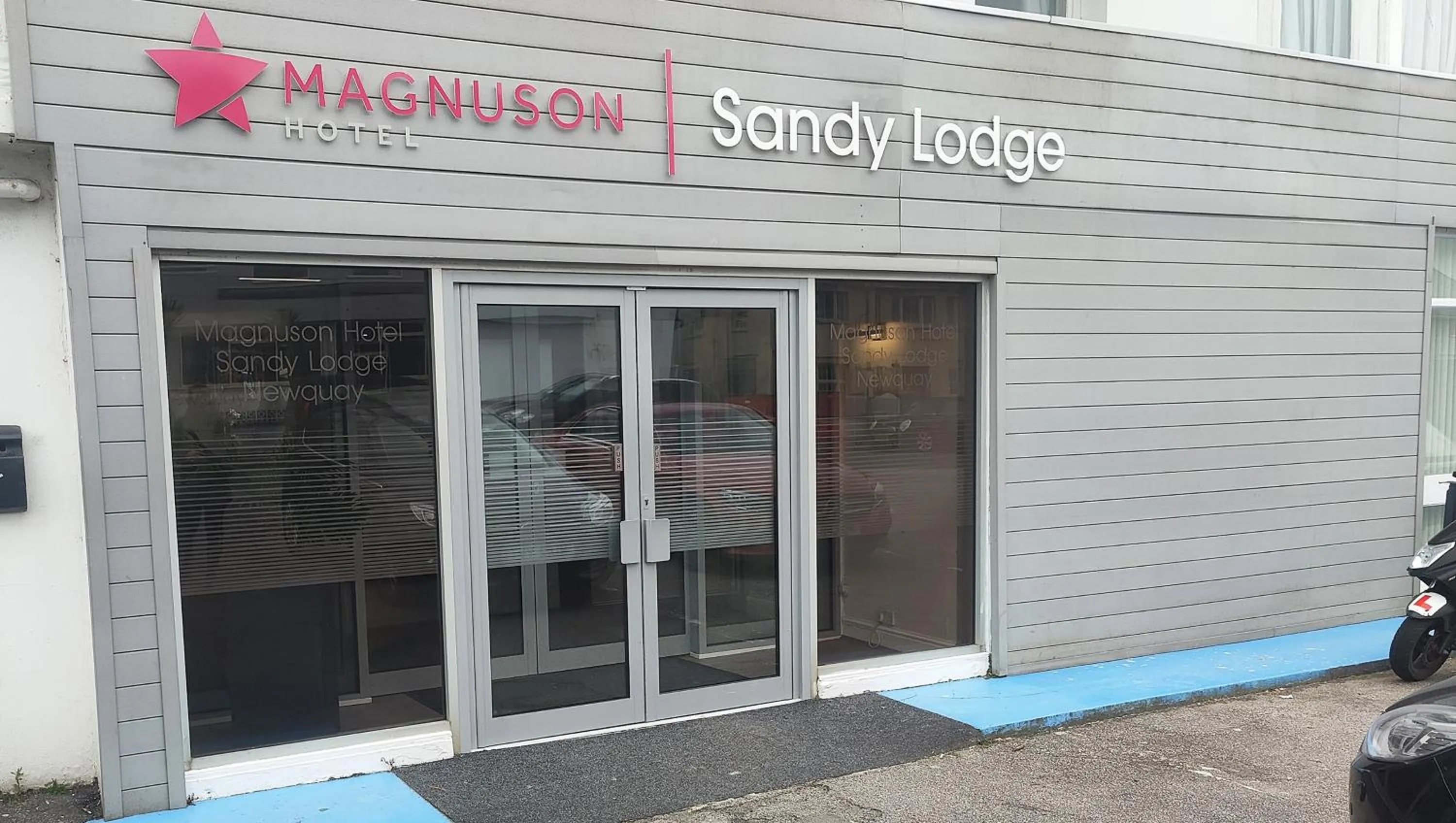 Property logo or sign in Magnuson Hotel Sandy Lodge Newquay