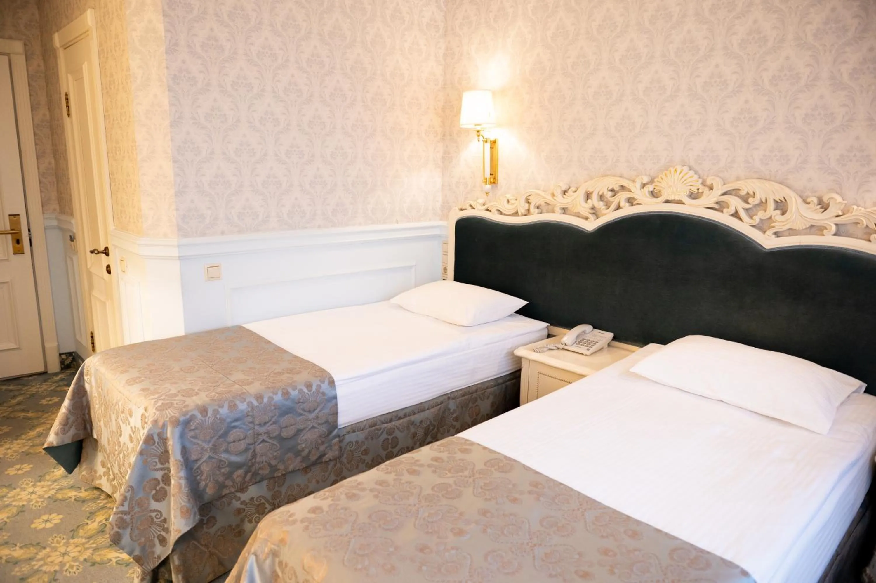 Bed in Olympic Hotel