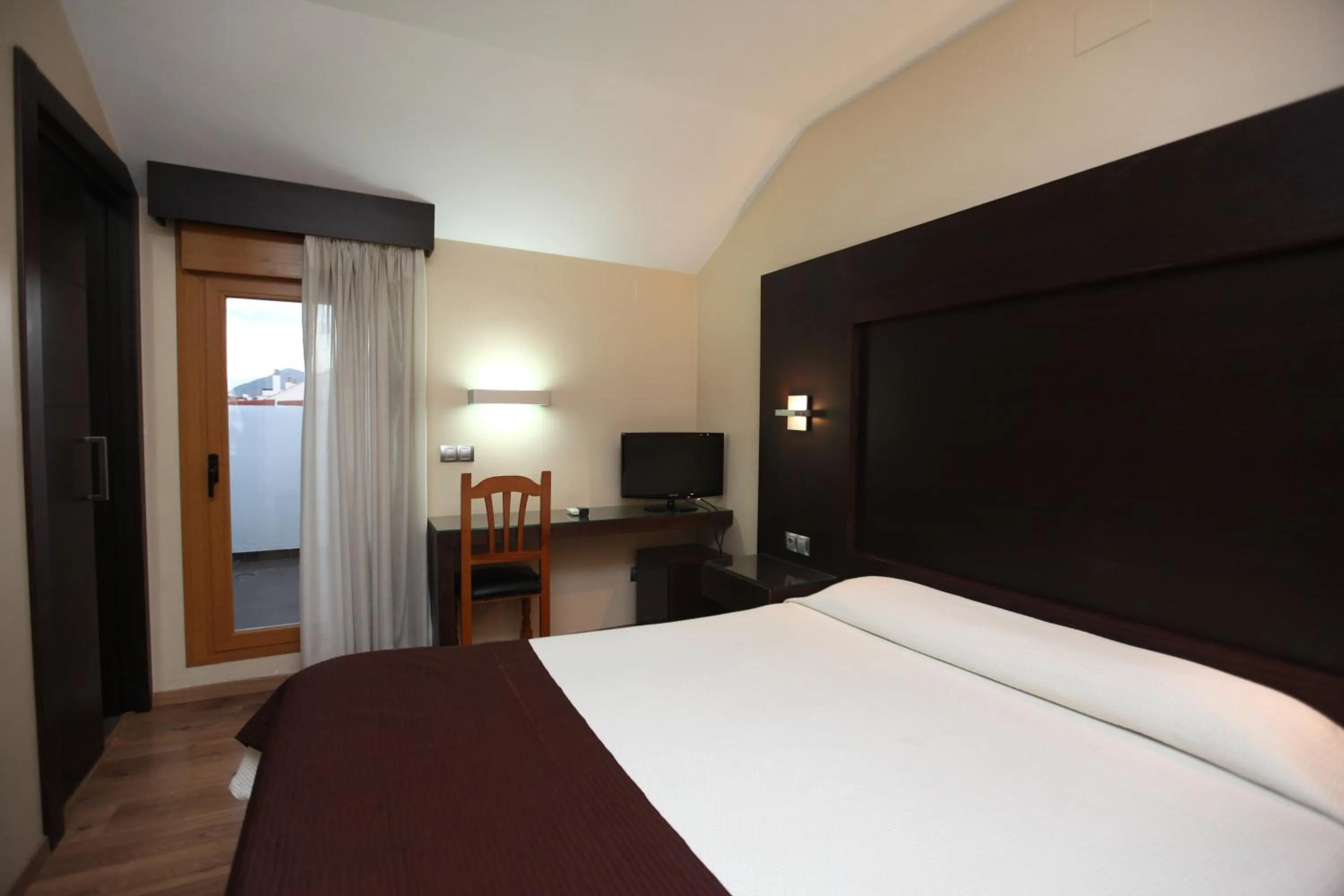 Decorative detail, Bed in Hotel Anabel Baza