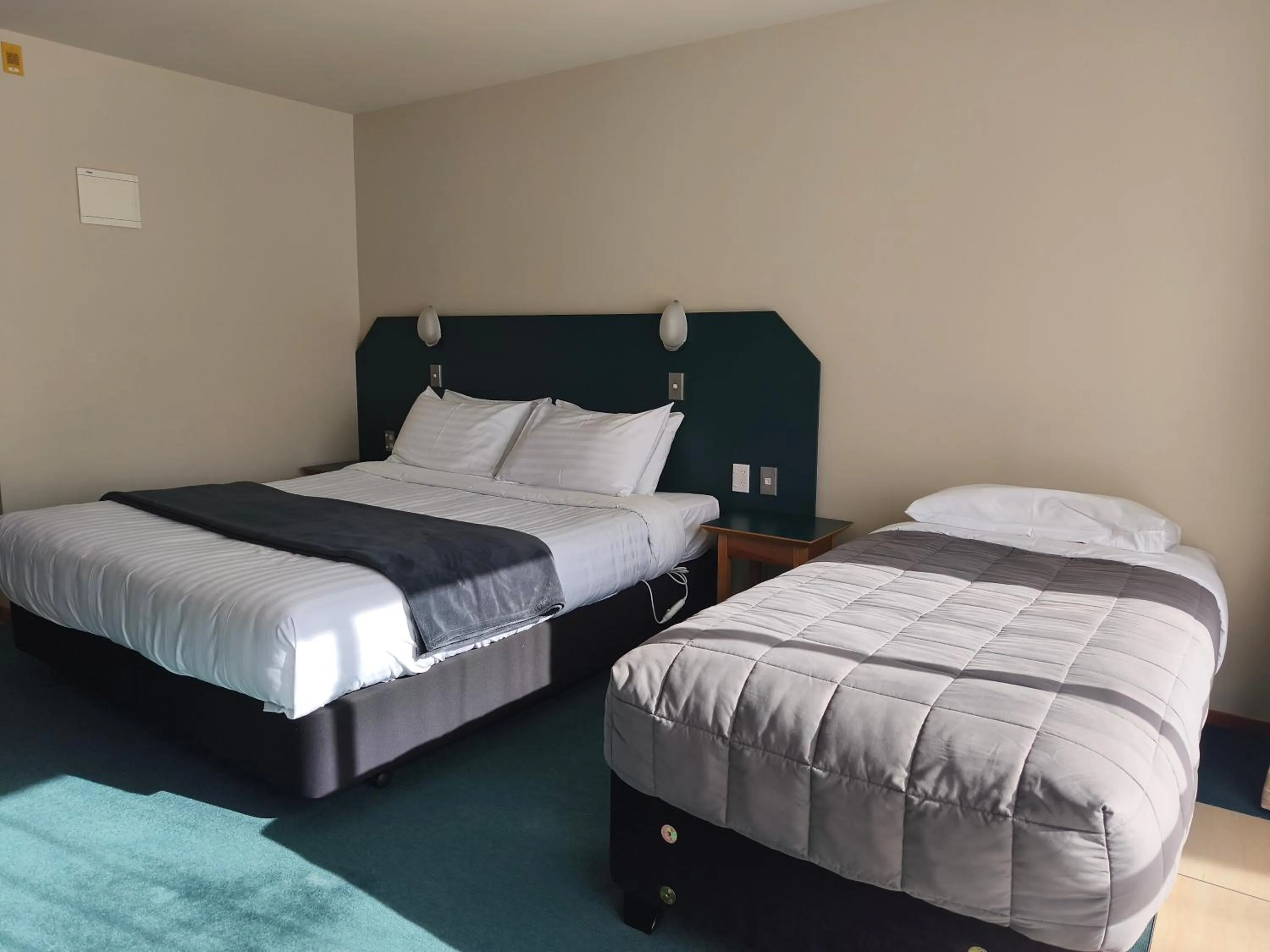 Bed in Aspen Lodge Motel